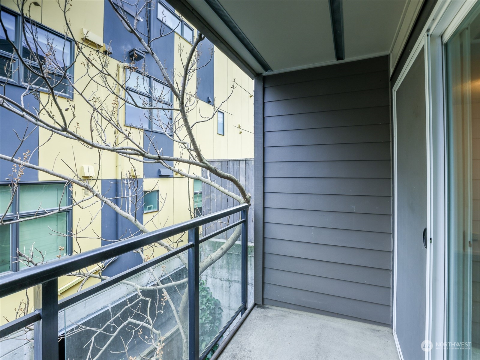 Large deck surrounding by beautful trees.