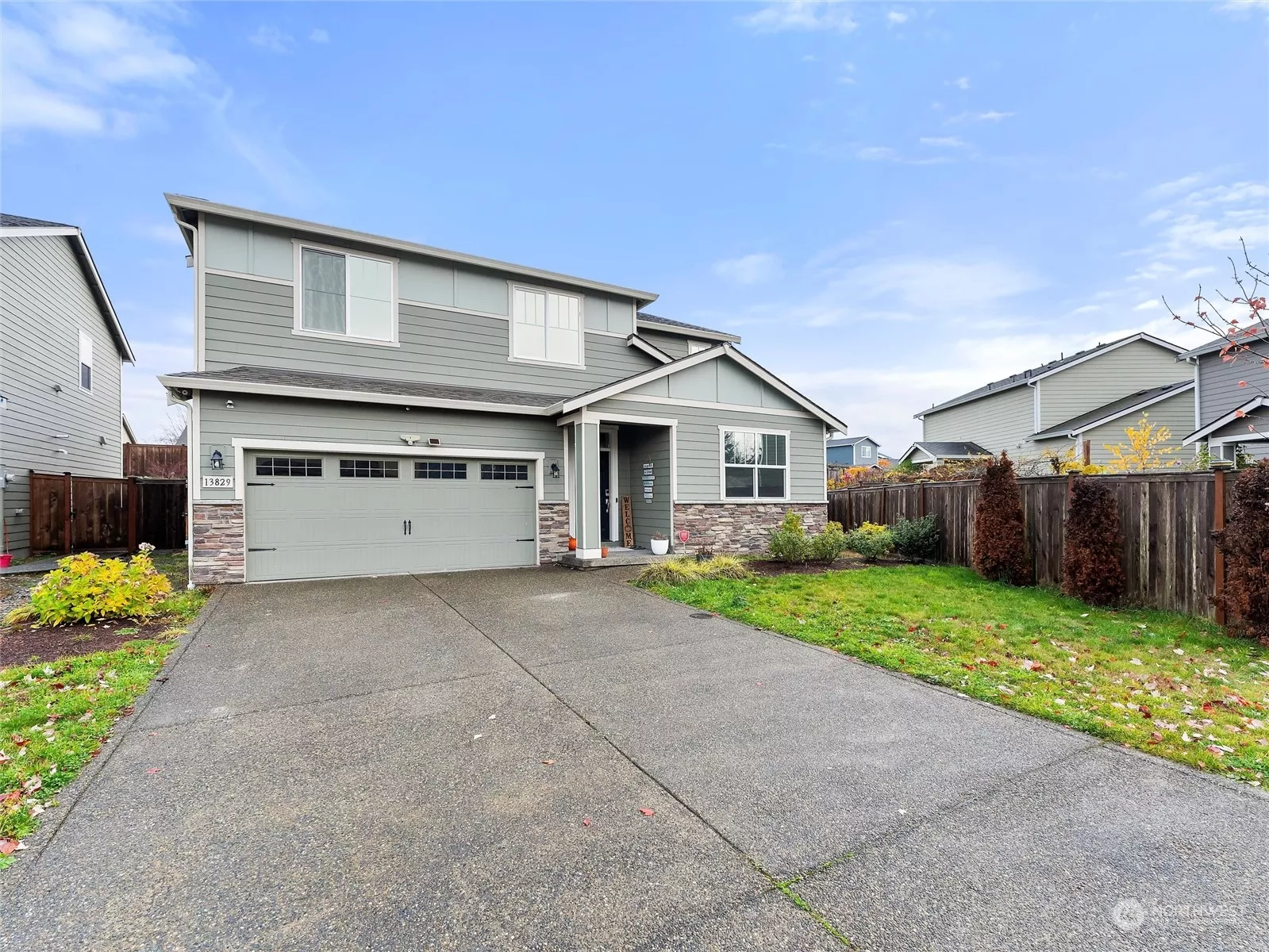 ample parking in the driveway, with additional street parking