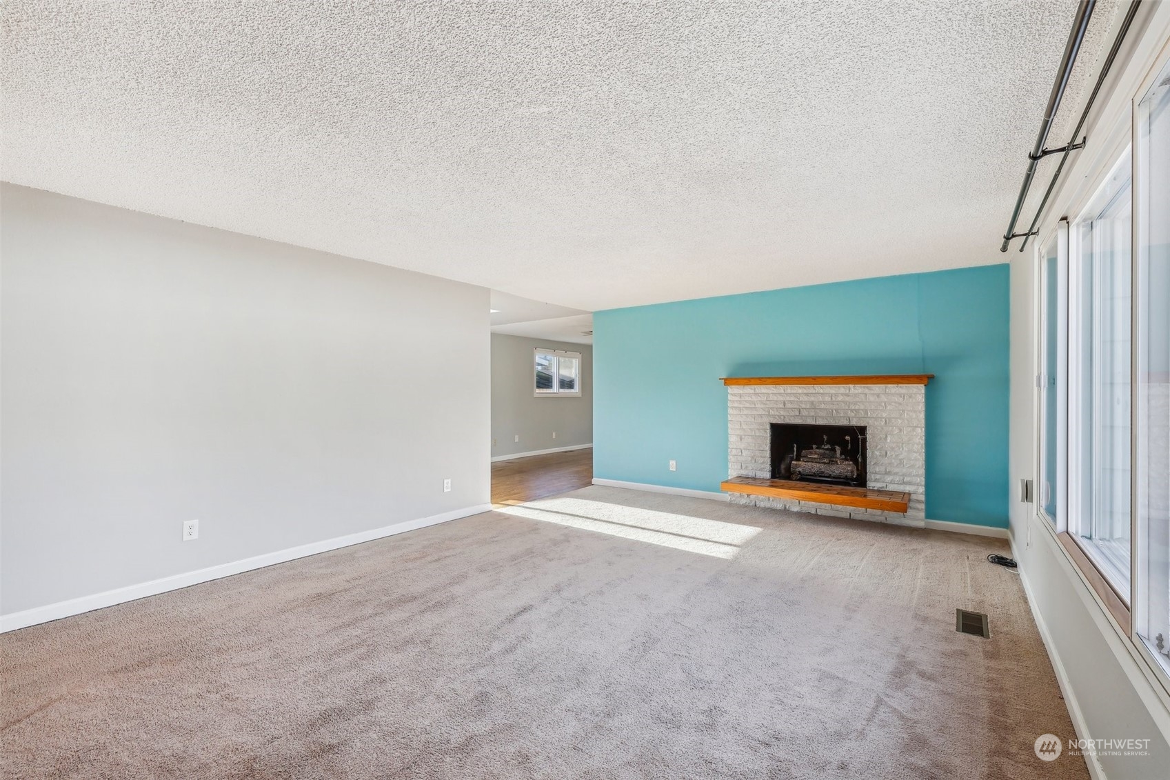 Living room and hallway to bedrooms