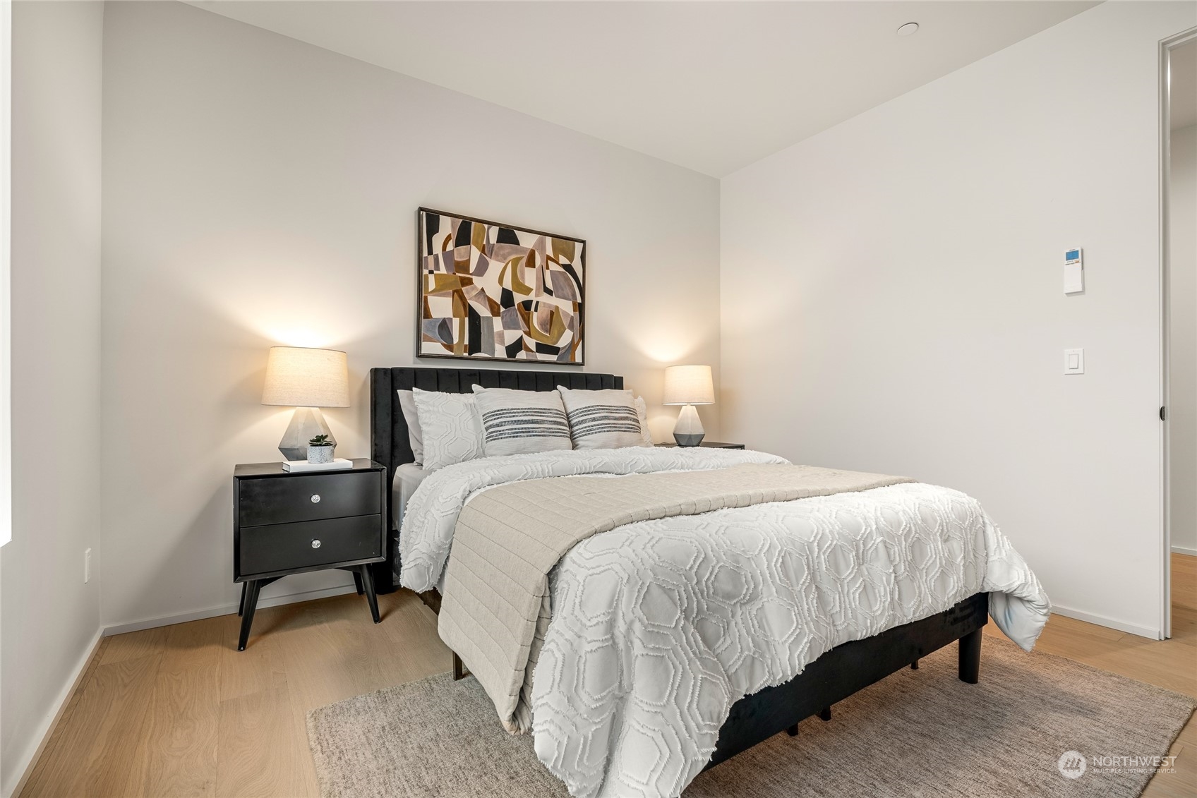 Upper-level bedroom with walk-in closet