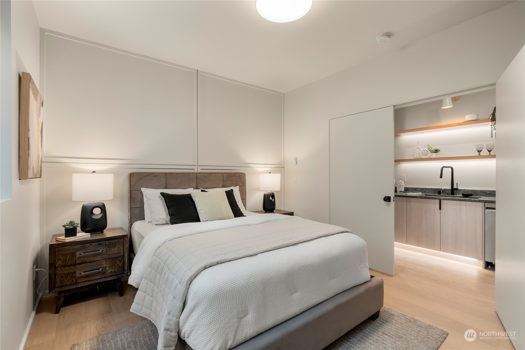 Lower-level bedroom with walk-in closet