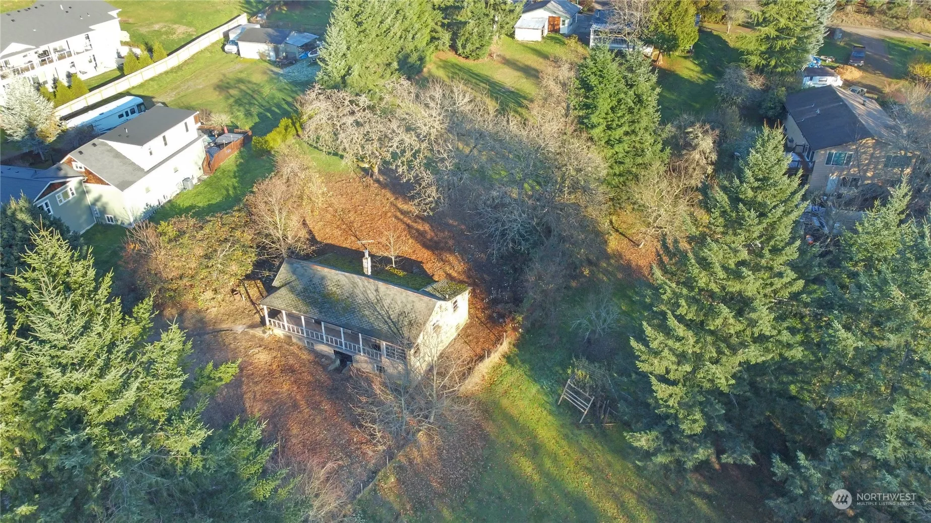 Partially Fenced Lot surrounded by newer homes