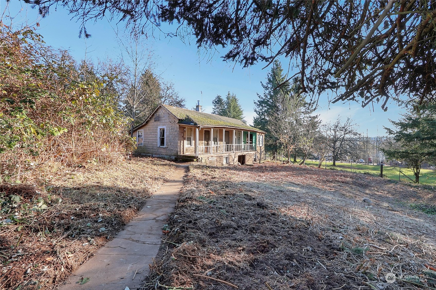 Follow the sidewalk from the driveway to the home