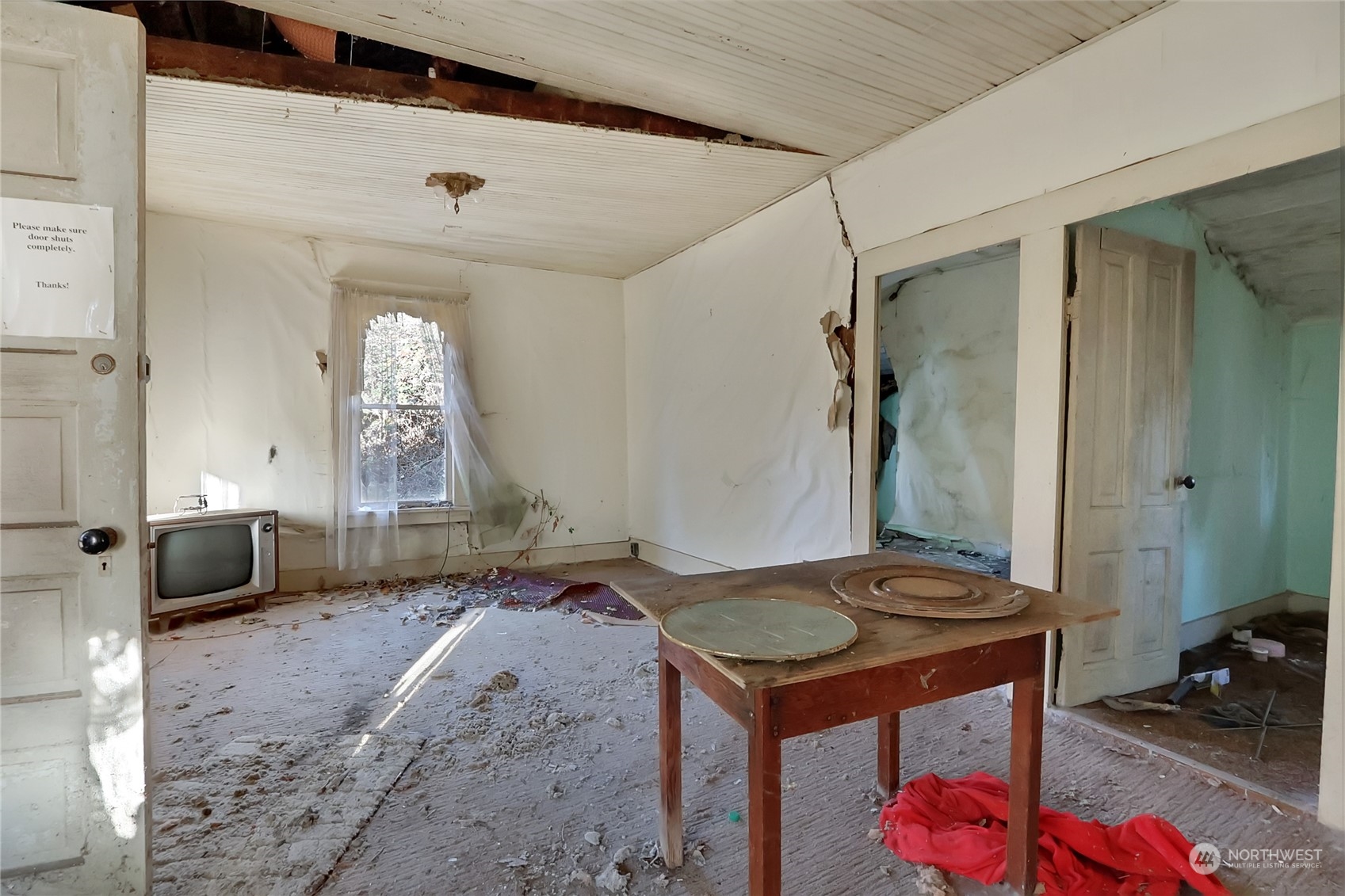 Living Room. Use Caution, as ceiling is falling in.