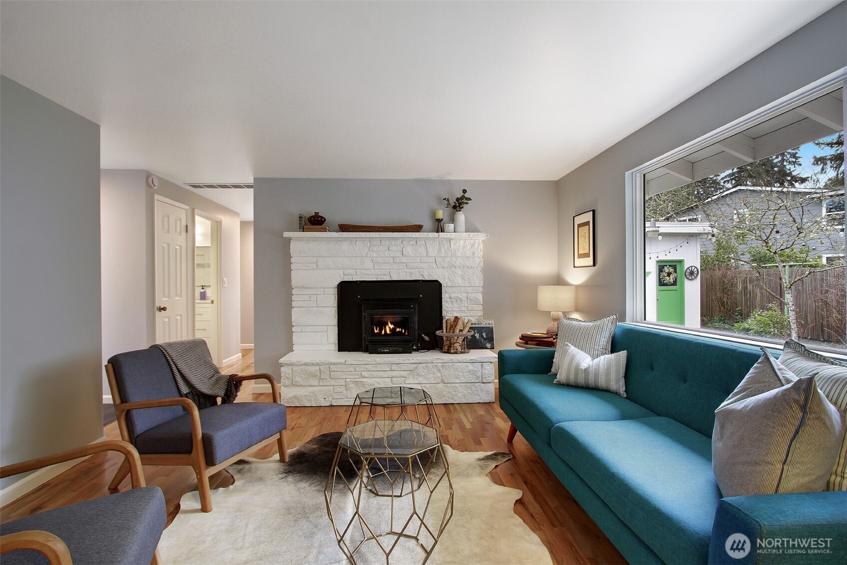 Living room with fireplace. One of two living areas.