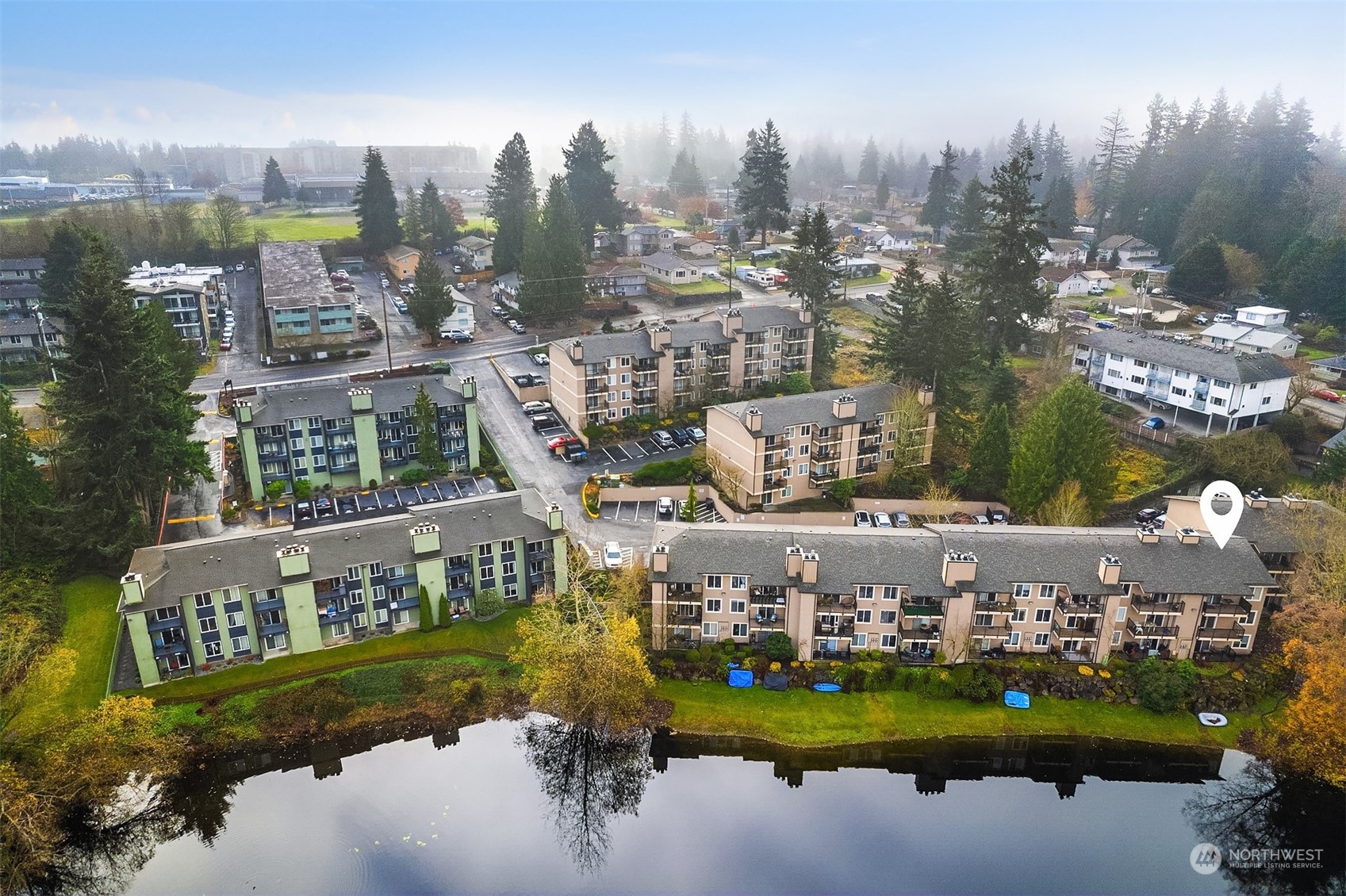 This corner unit looks directly out at Beverly Lake