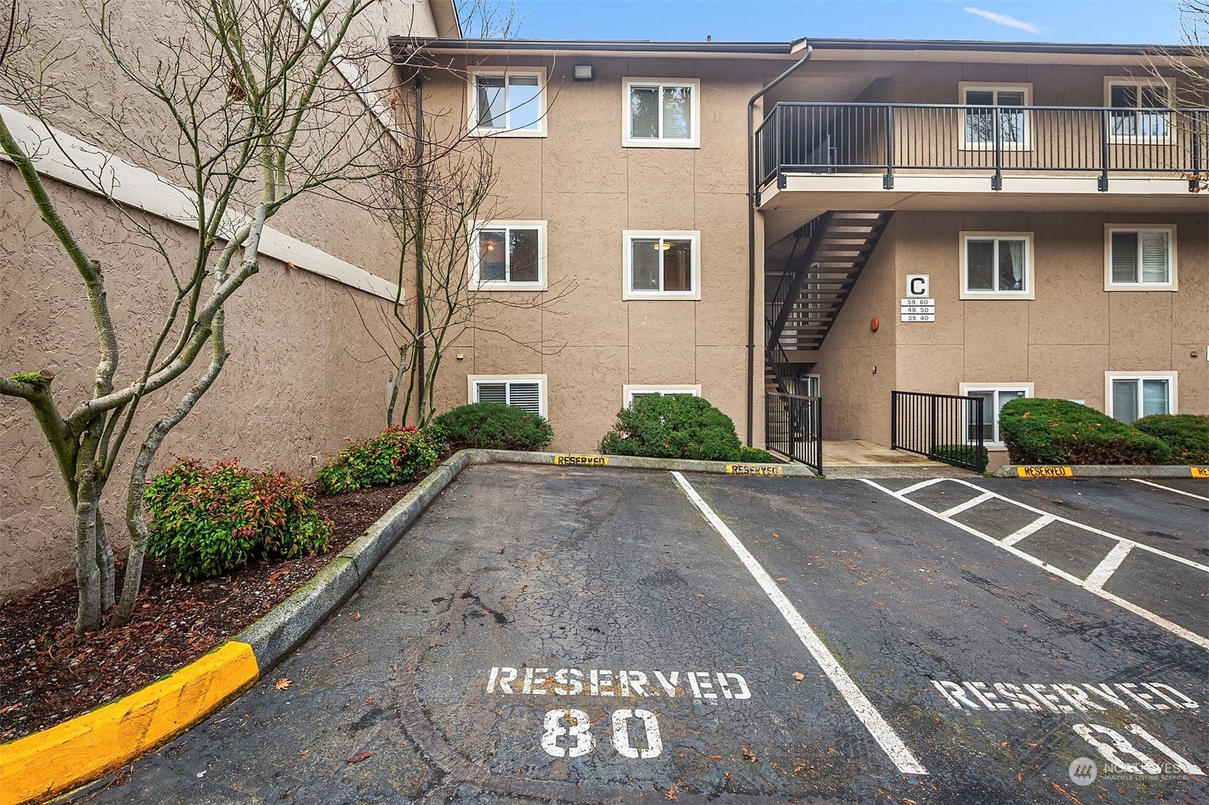 Parking space 80 is assigned to this unit, right next to the building and with only one parking spot next to it.