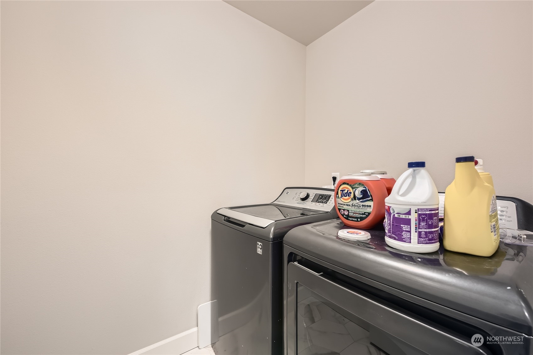 Laundry room; washer and dryer stay.