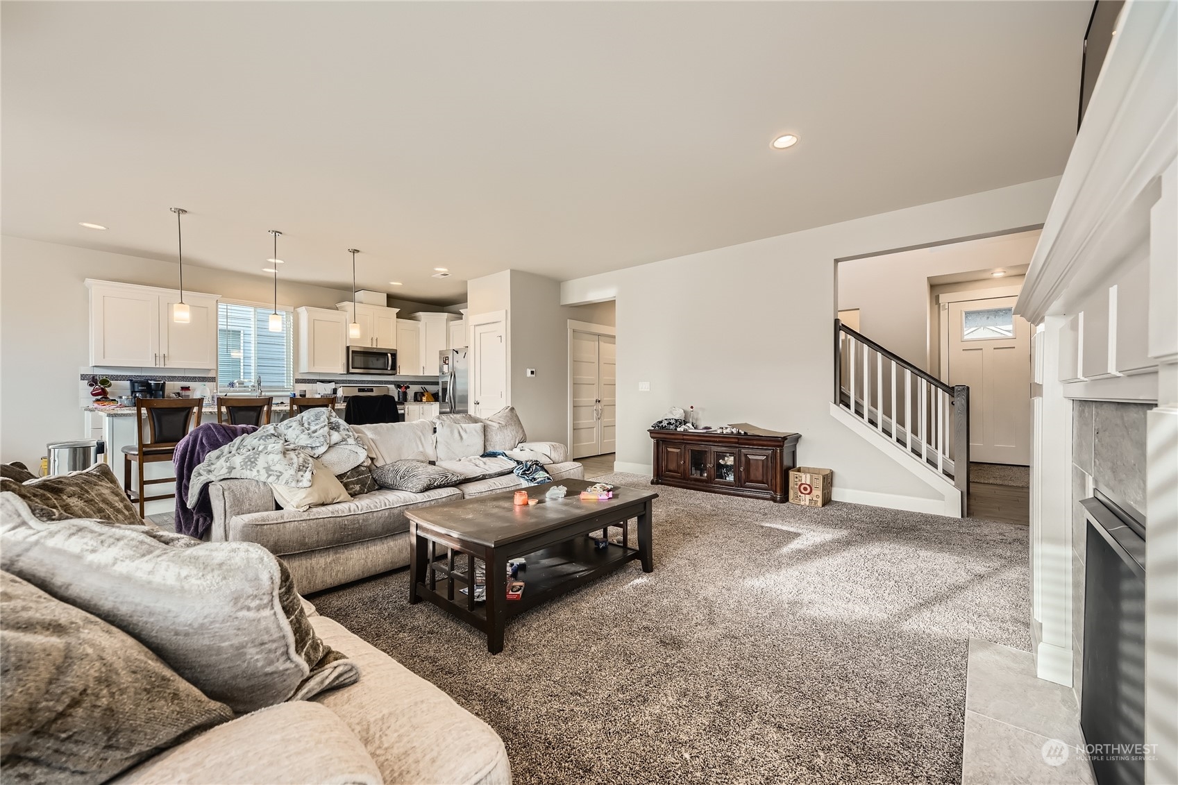 Living and dining area opens to the kitchen.