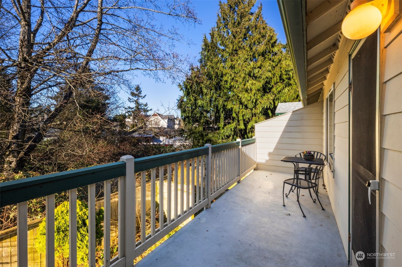 A great photo of the balcony, which looks out onto greenspace.