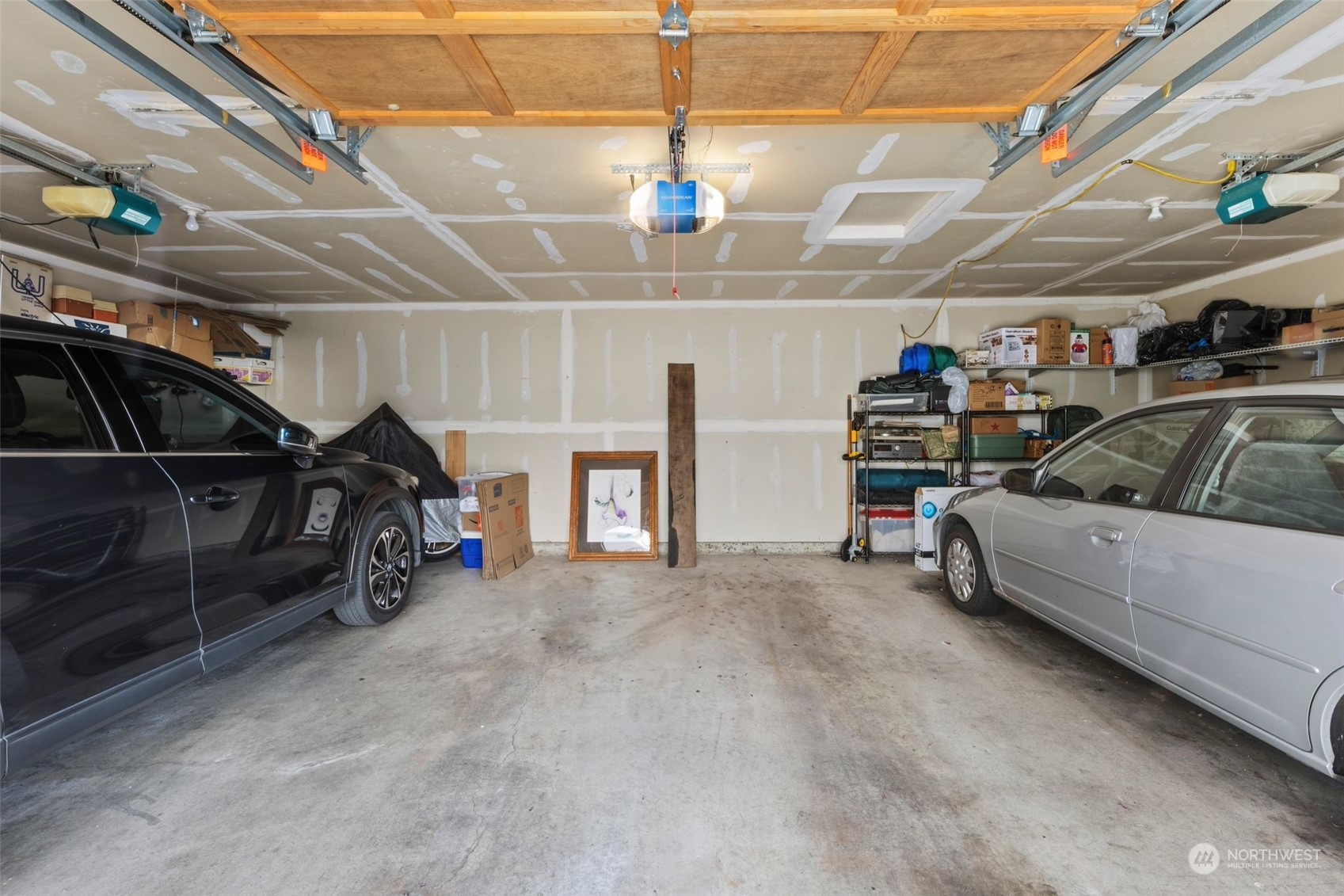 This a shared garage, there is room for storage on the back wall, and enough room for your car too!