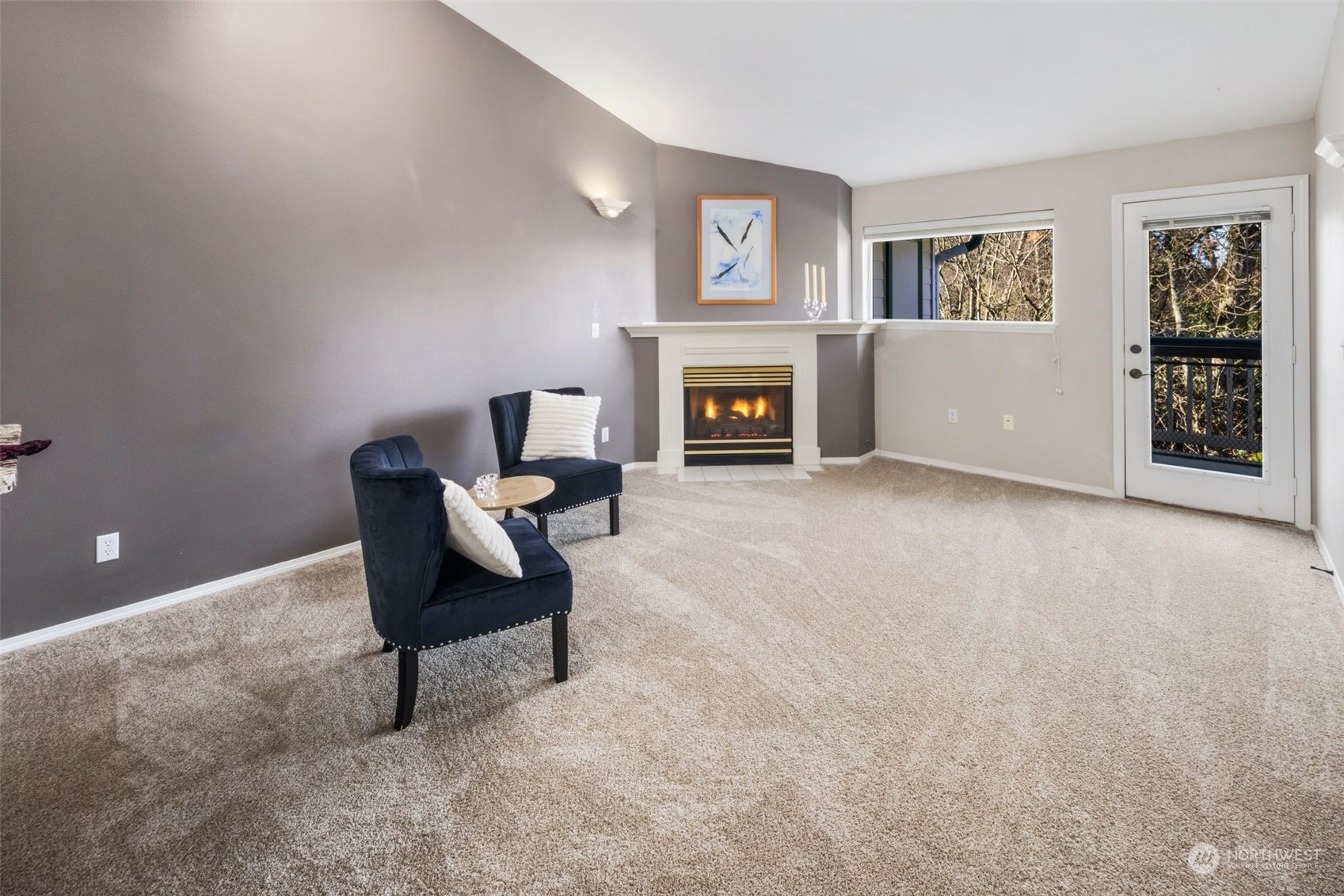 Another angle of the living room, with door to the private balcony.