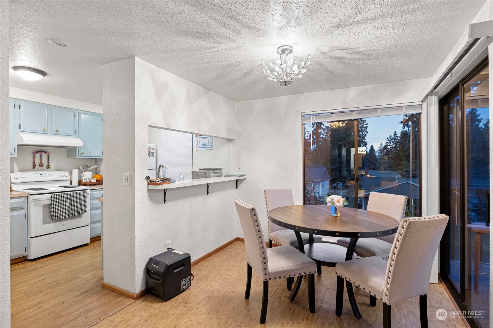 Unit 1 kitchen/Dining area and slider to porch