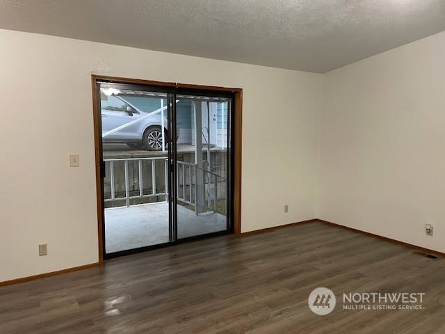 Dining room with slider to front covered deck