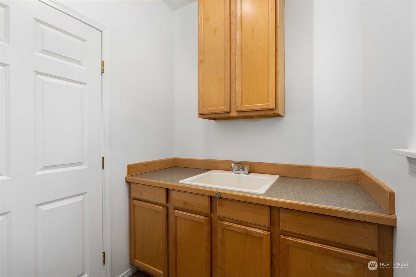 Mudroom Sink - Functional sink and storage area, perfect for cleaning up.