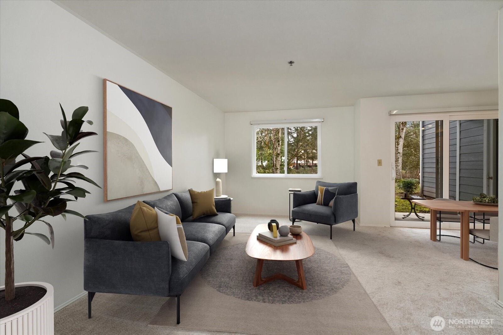 Living area flows into dining area and outside patio.  Freshly painted and new carpet.  Virtually staged.