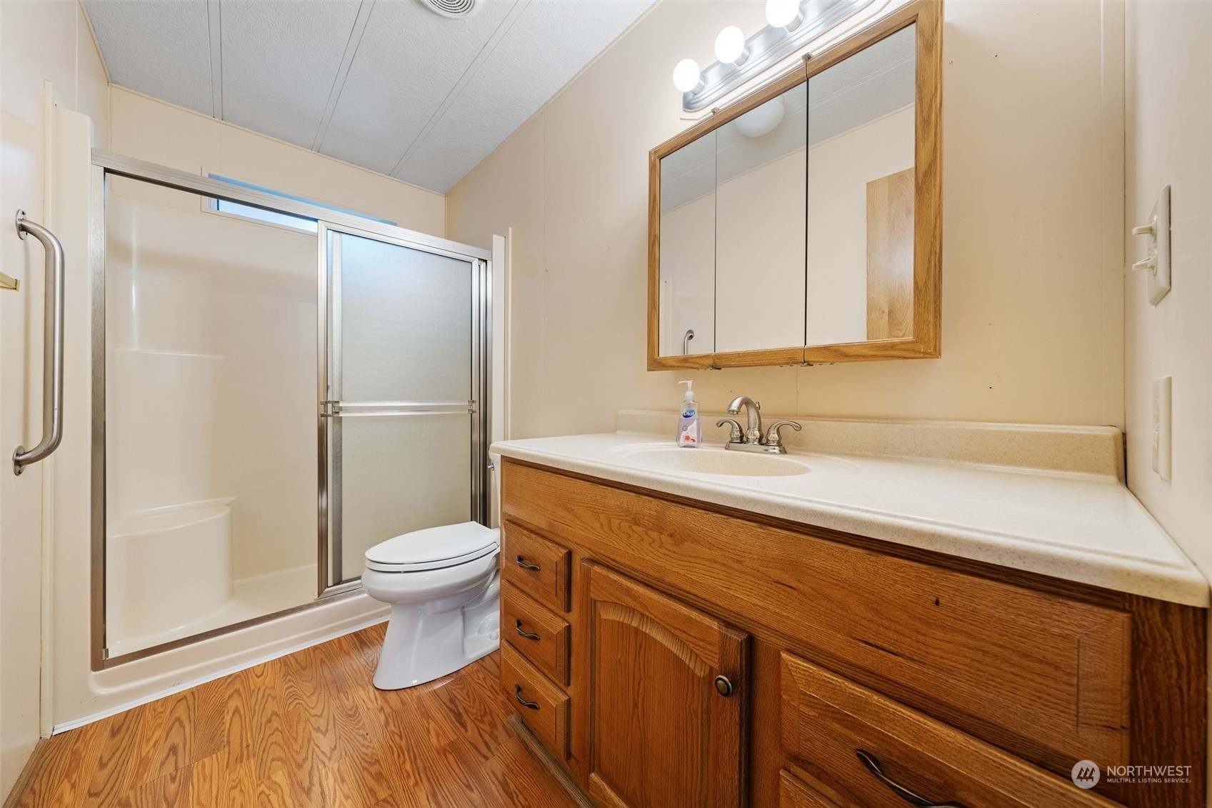 Soaking tub in Primary suite. Double sinks and lots of cabinets for storage.