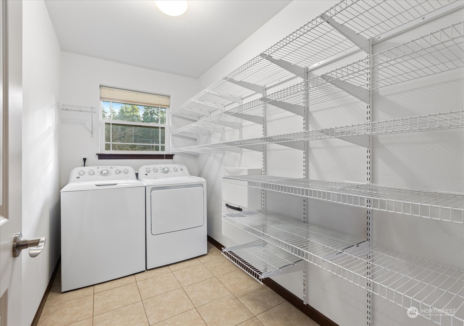 Specious Laundry Room with Shelves Upstairs