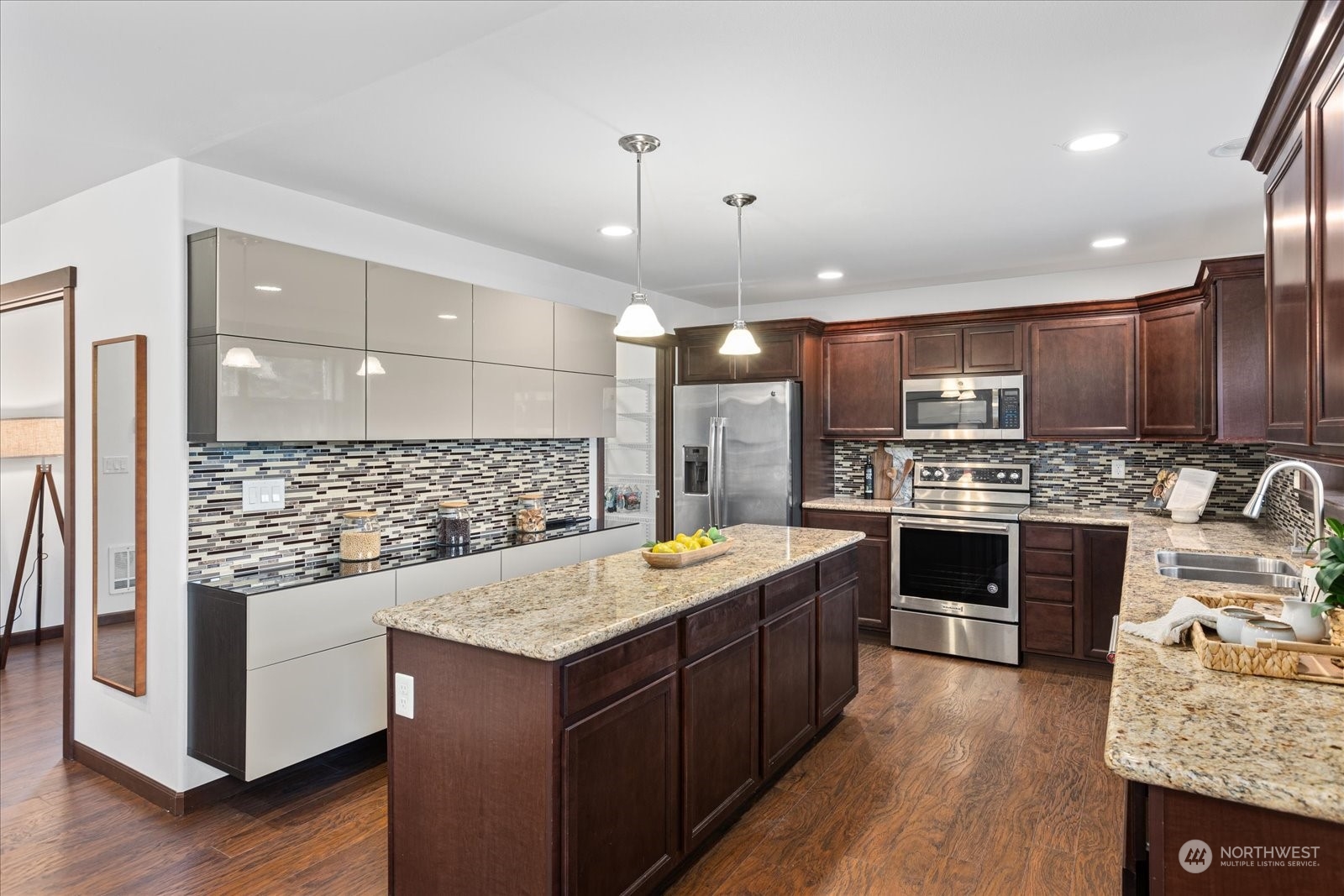 Extra Storage in Kitchen with Gorgeous Back splash all around