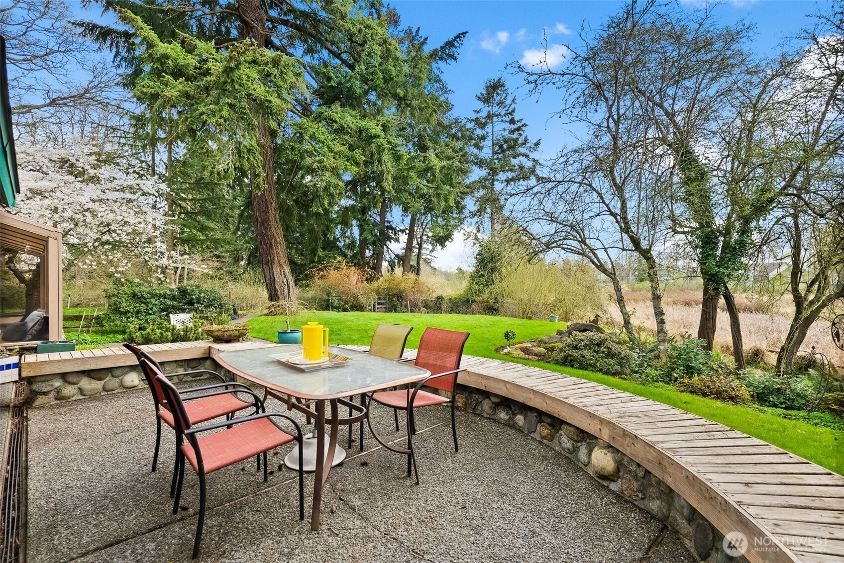 Patio off the kitchen with views of Mt. Rainier & the pond
