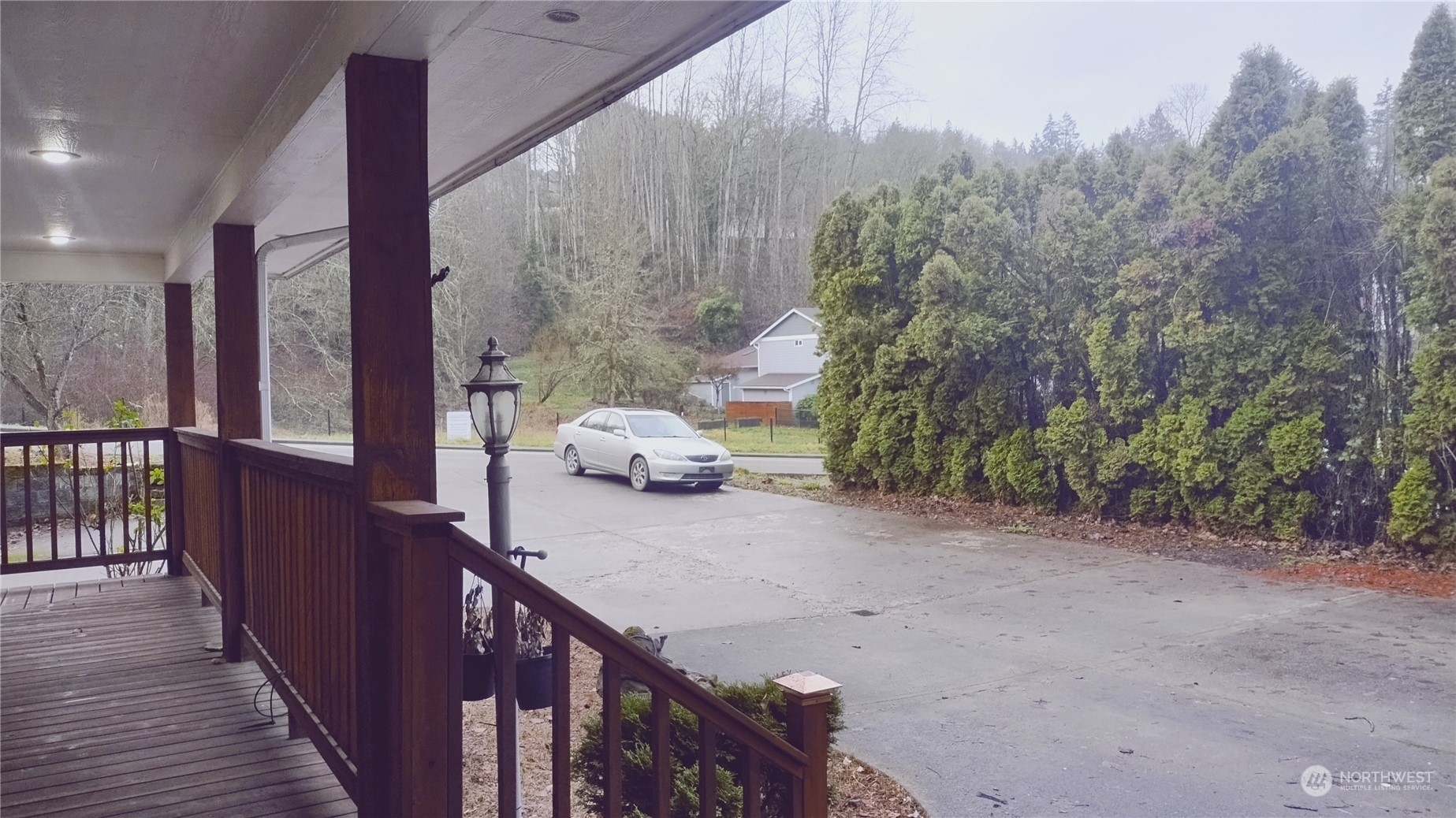 More pics to come.  Owner is almost moved out-this is a view of the neighboring property to the north.  The trees will have leaf coverage in spring until fall.