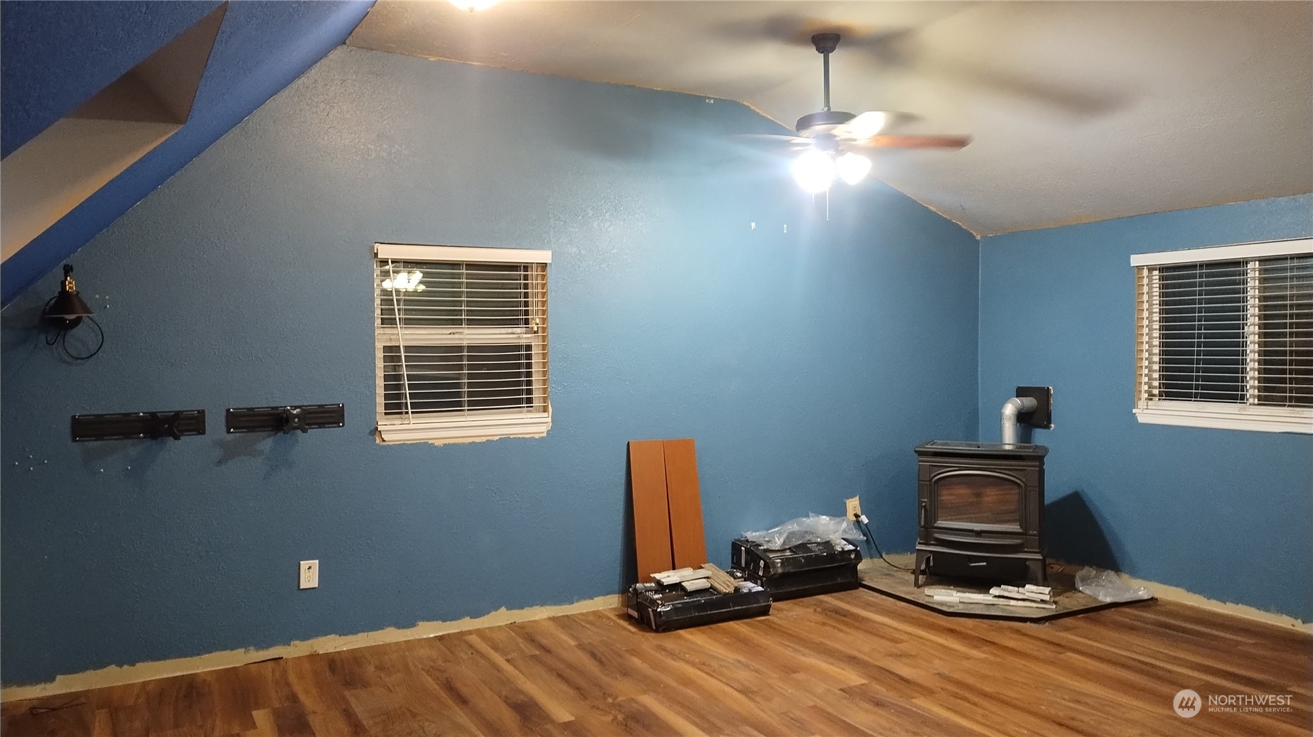 More pics to come.  This is a partial view of the bonus room above the garage that has a newer pellet stove and is wired for wall heaters.