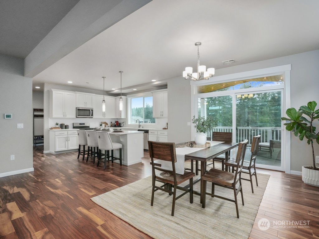 Dining Room and Covered Deck for Entertaining