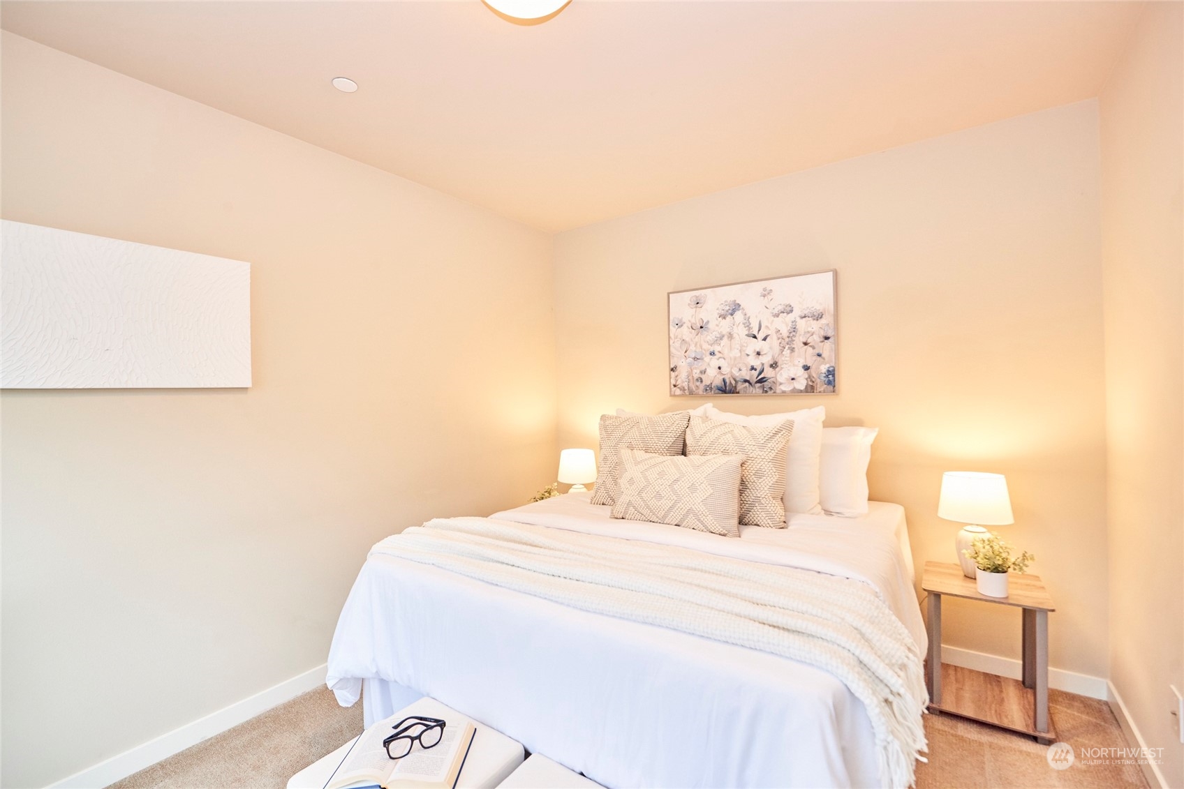 Here's bedroom #2 with a walk in closet and en-suite bathroom with shower surround and a double sink vanity.