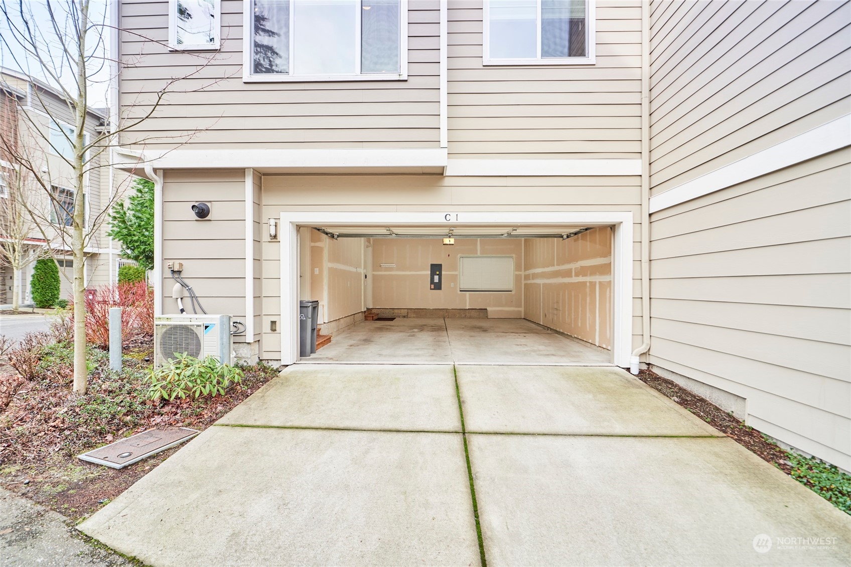 A look at the 2 car garage from the end of the driveway.