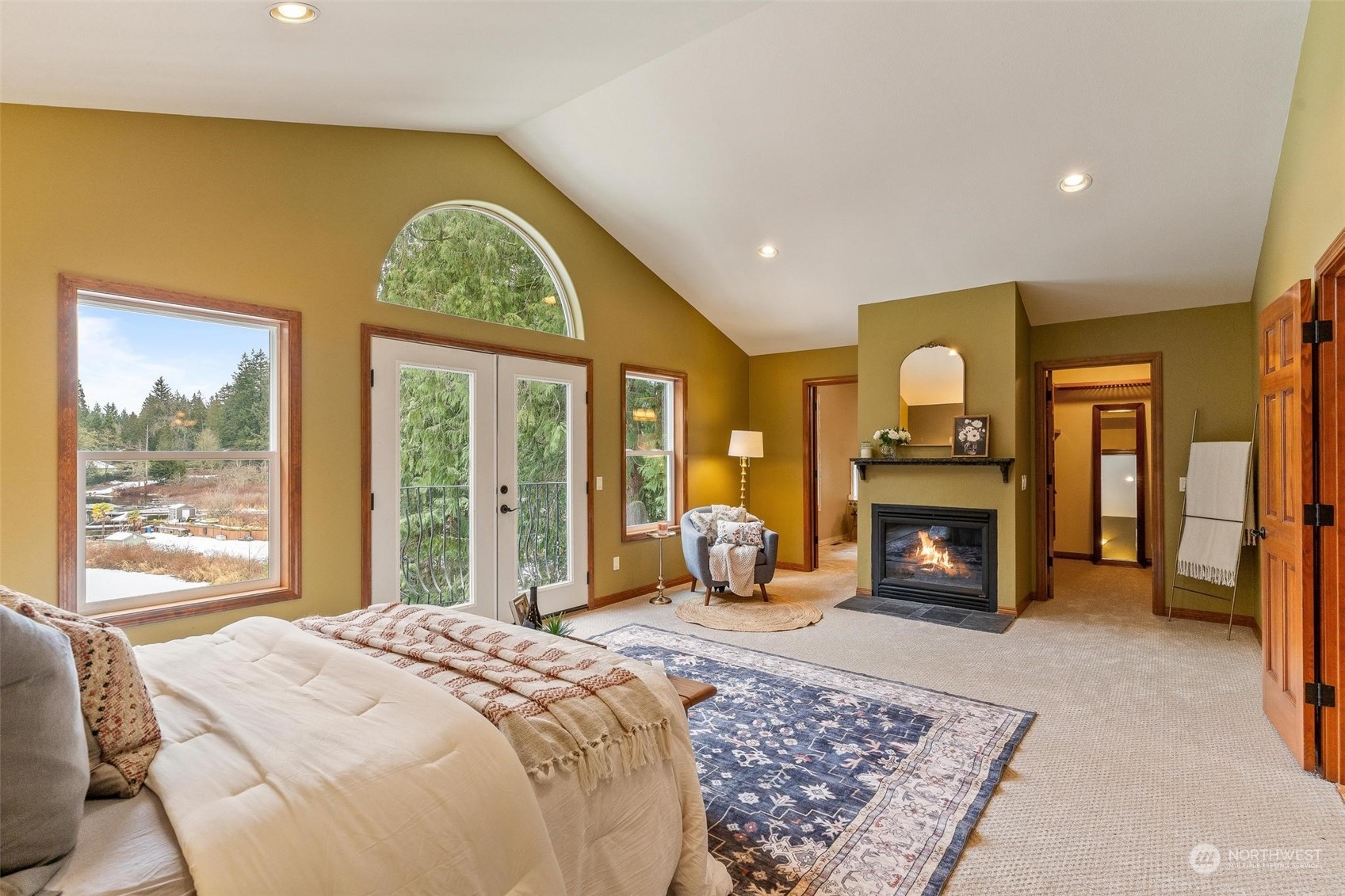 Primary bedroom with a luxurious view.