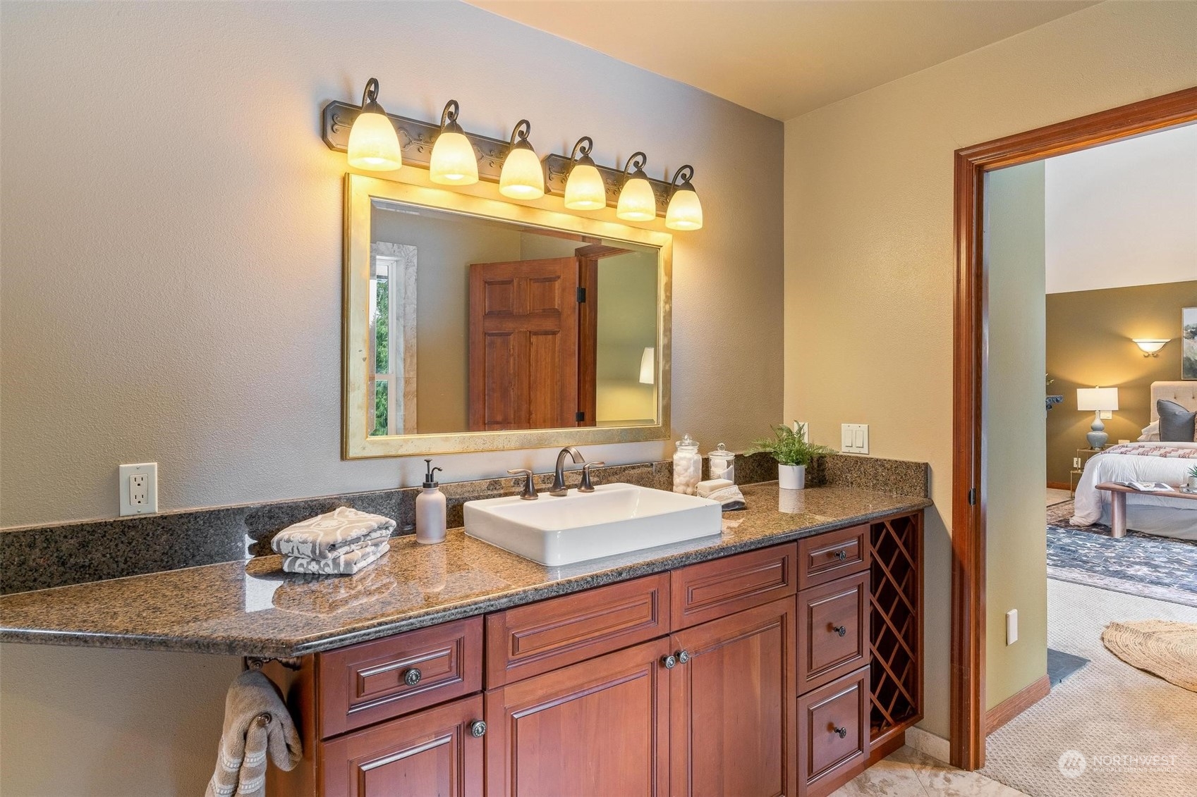 Spa-Inspired Ensuite with soaking tub, walk-in rain shower.