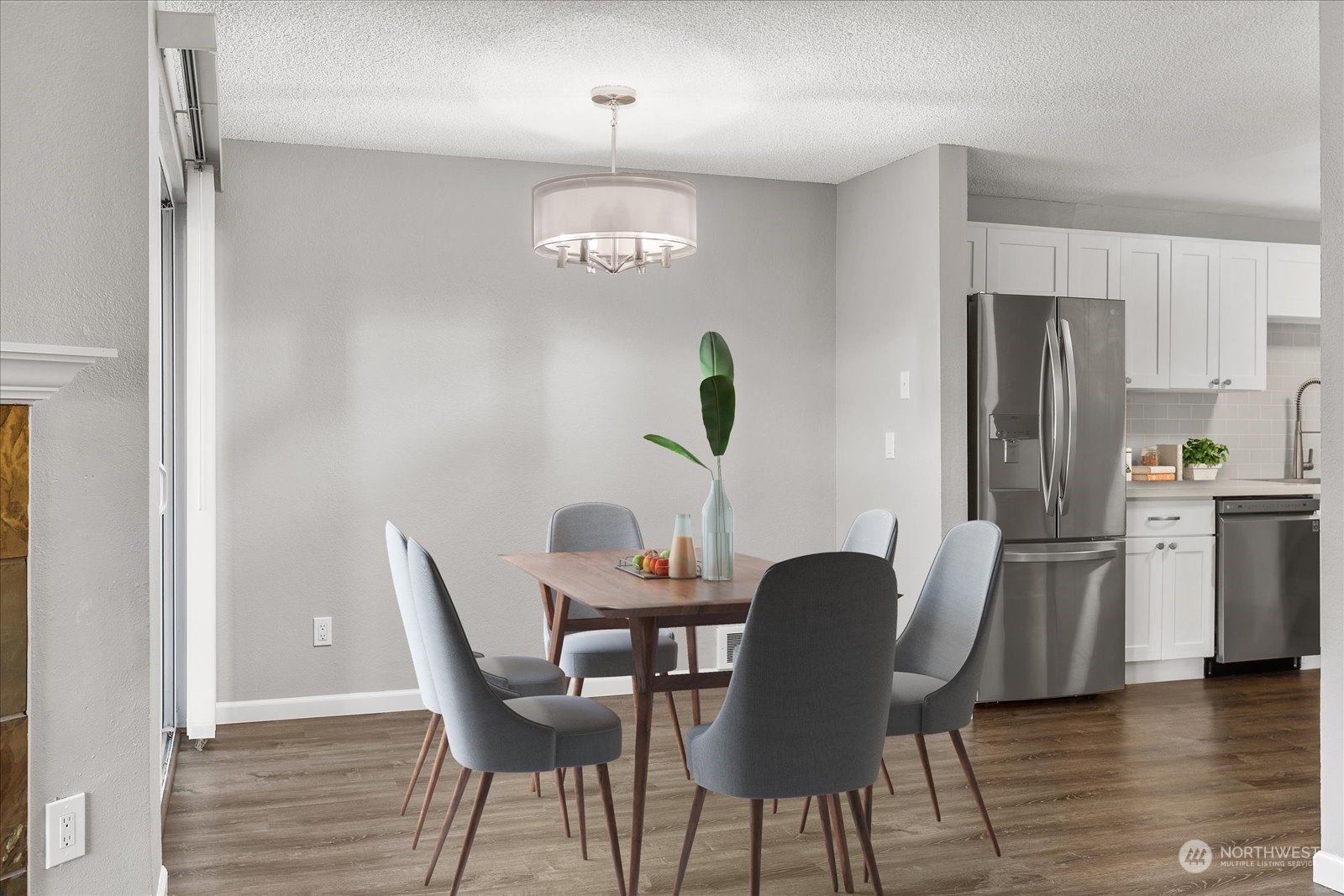 Dining Area w/ Sliding door that leads to the Private Patio/Deck