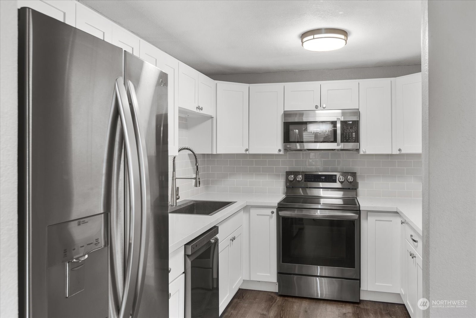 Kitchen w/ Stainless Steel appliances