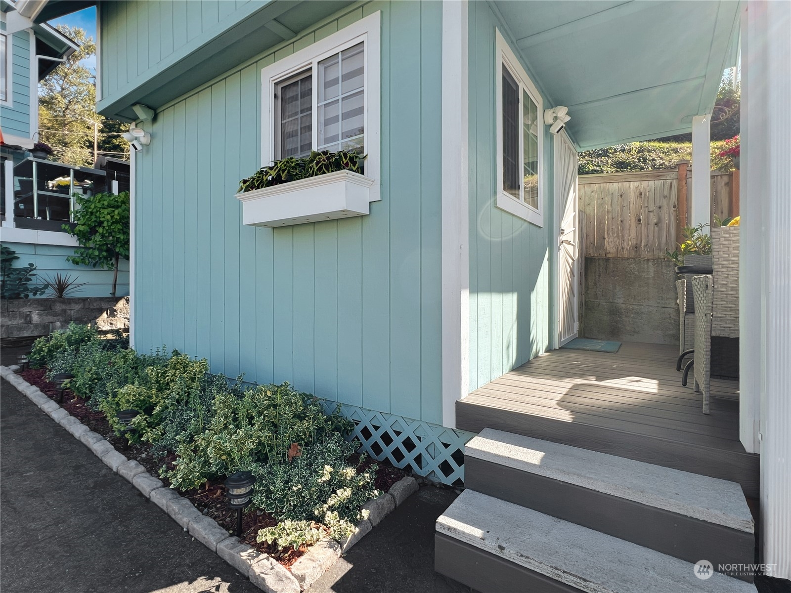 Primary bedroom with exterior deck with sound view.