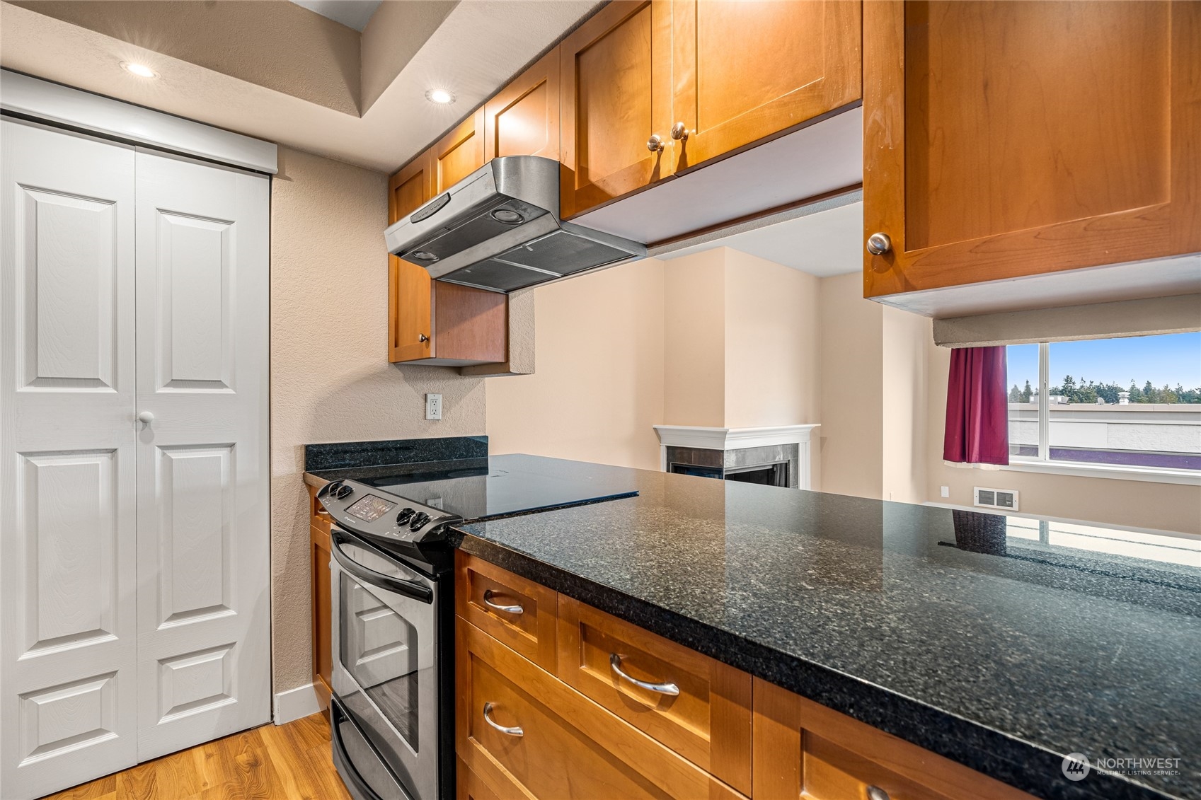 Granite countertops in kitchen. New dishwasher.