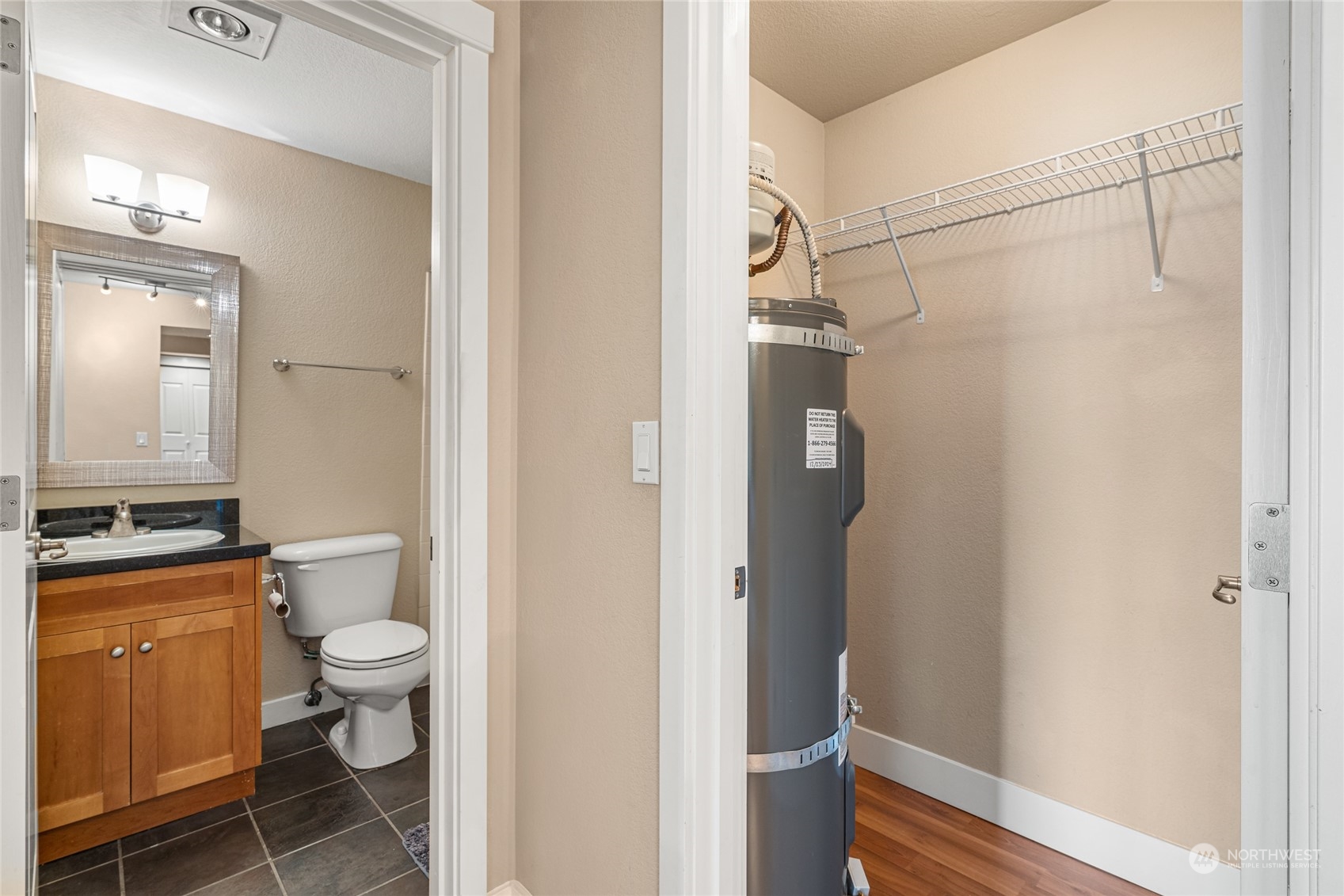 Water heater in front closet.