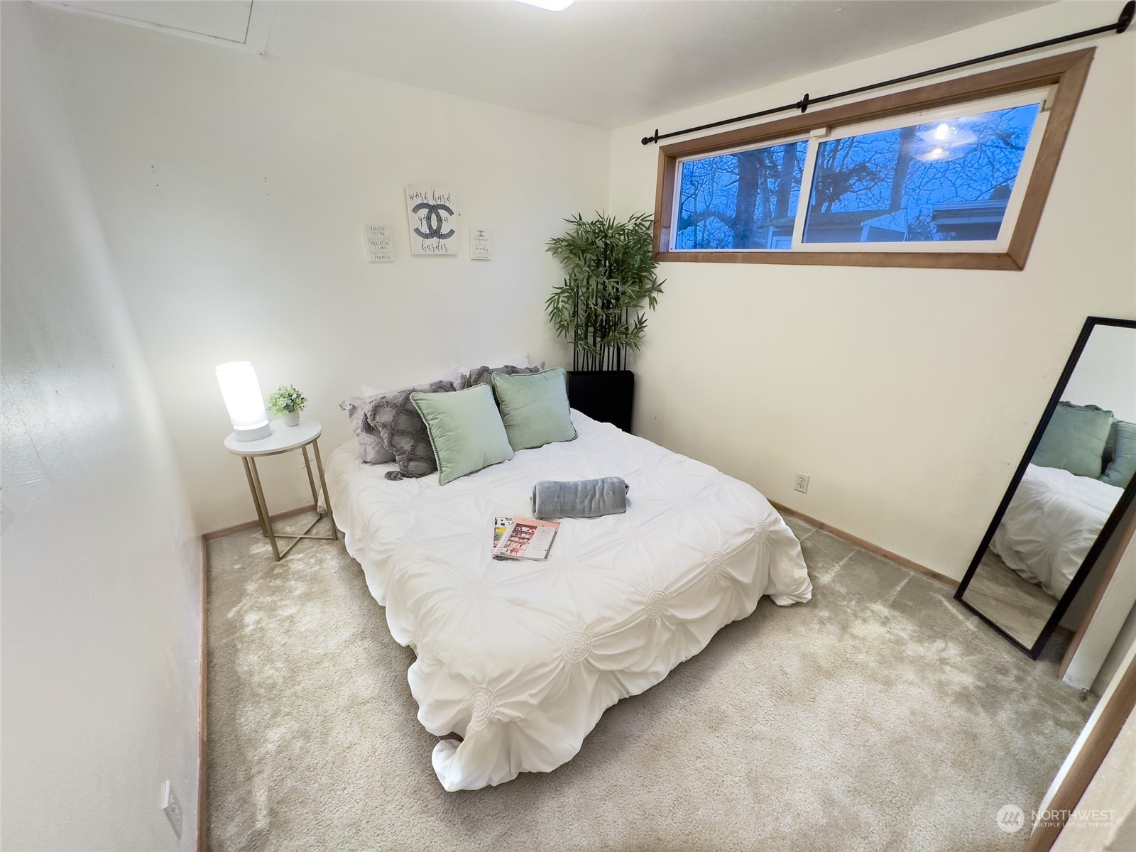 Bedroom 2 & Access to Attic Space. Attic Space offers 340+/- sqft of unfinished space. Could potentially be a future home expansion project.