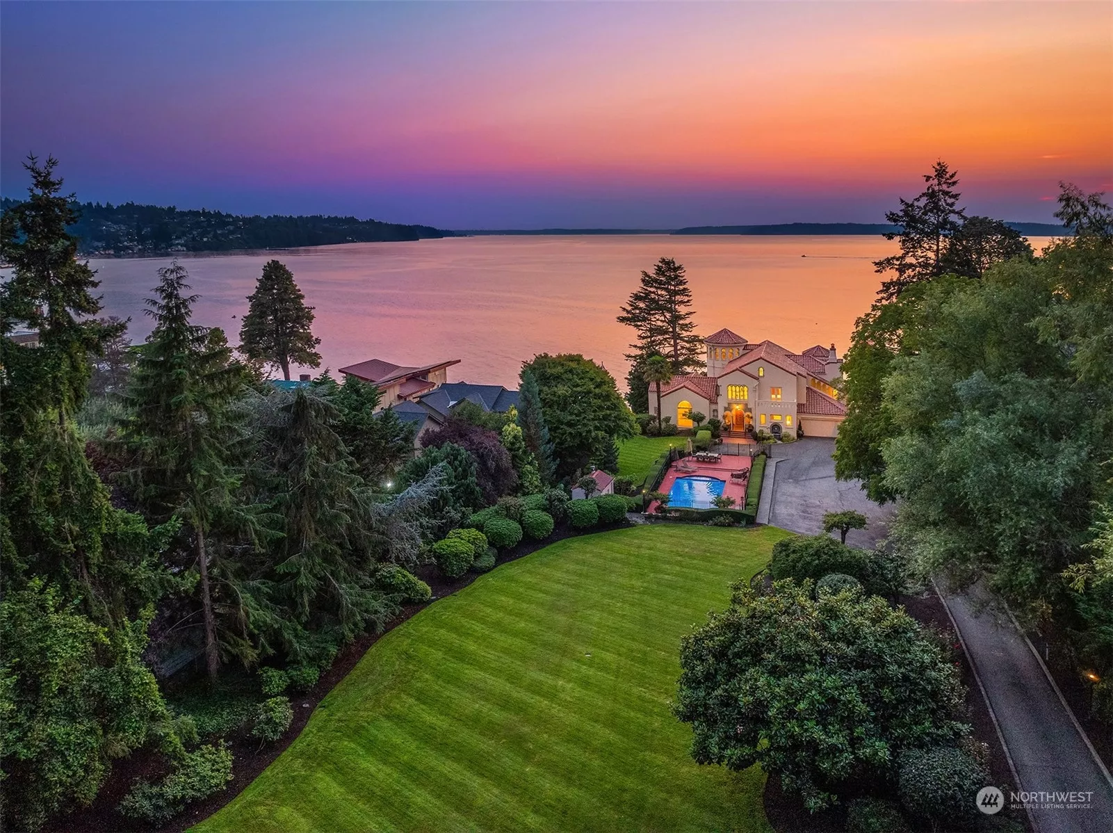 Welcome to the "Castle" bordering 140 feet of Puget Sound shore.