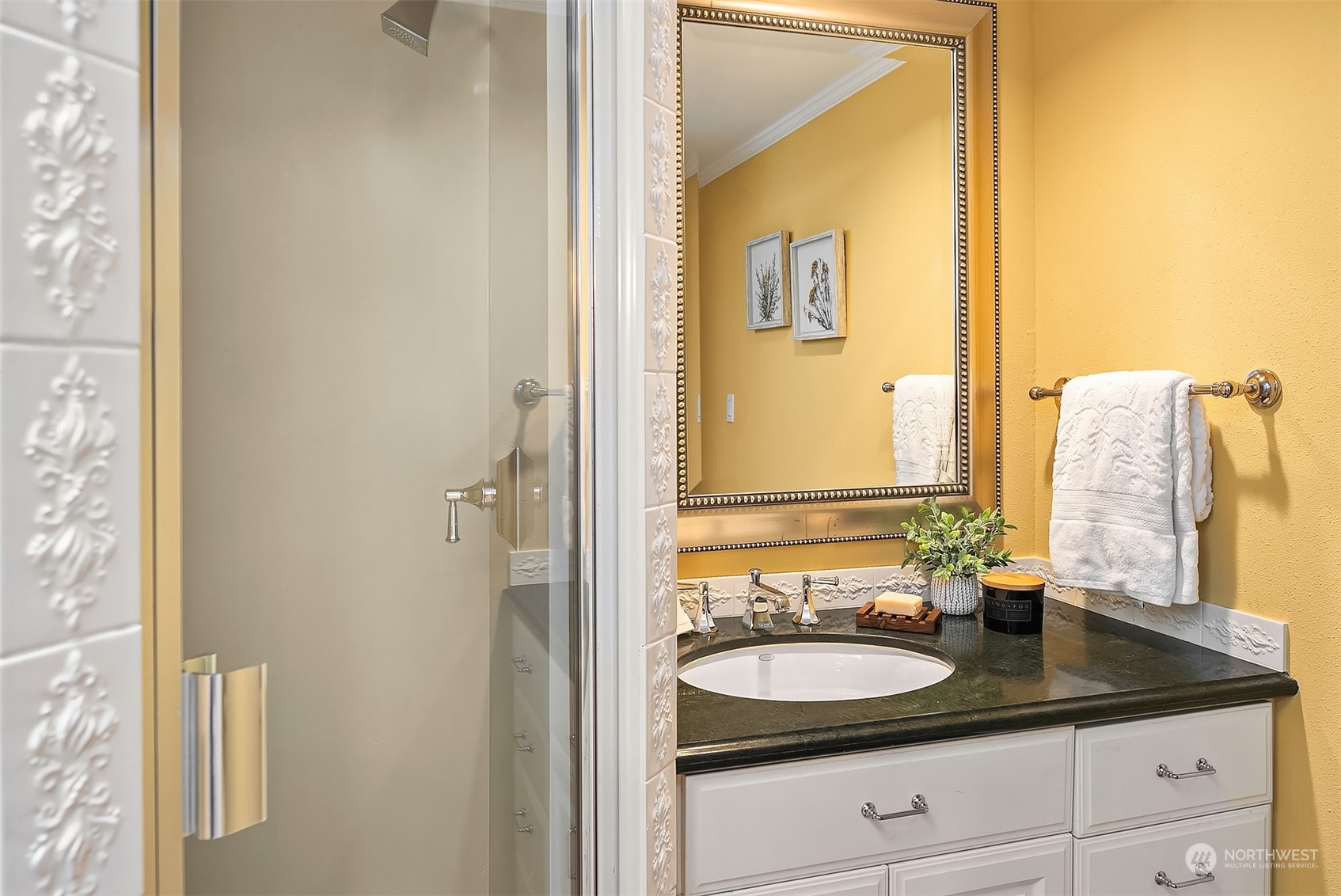 This is one of two 3/4 bathrooms with walk in showers and lovely finishes.