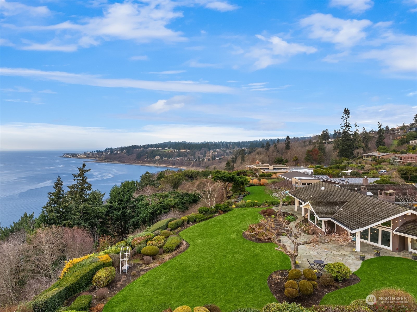 The wrap around view extends through Richmond Beach to Edmonds. You can even spot the train coming around the bend!