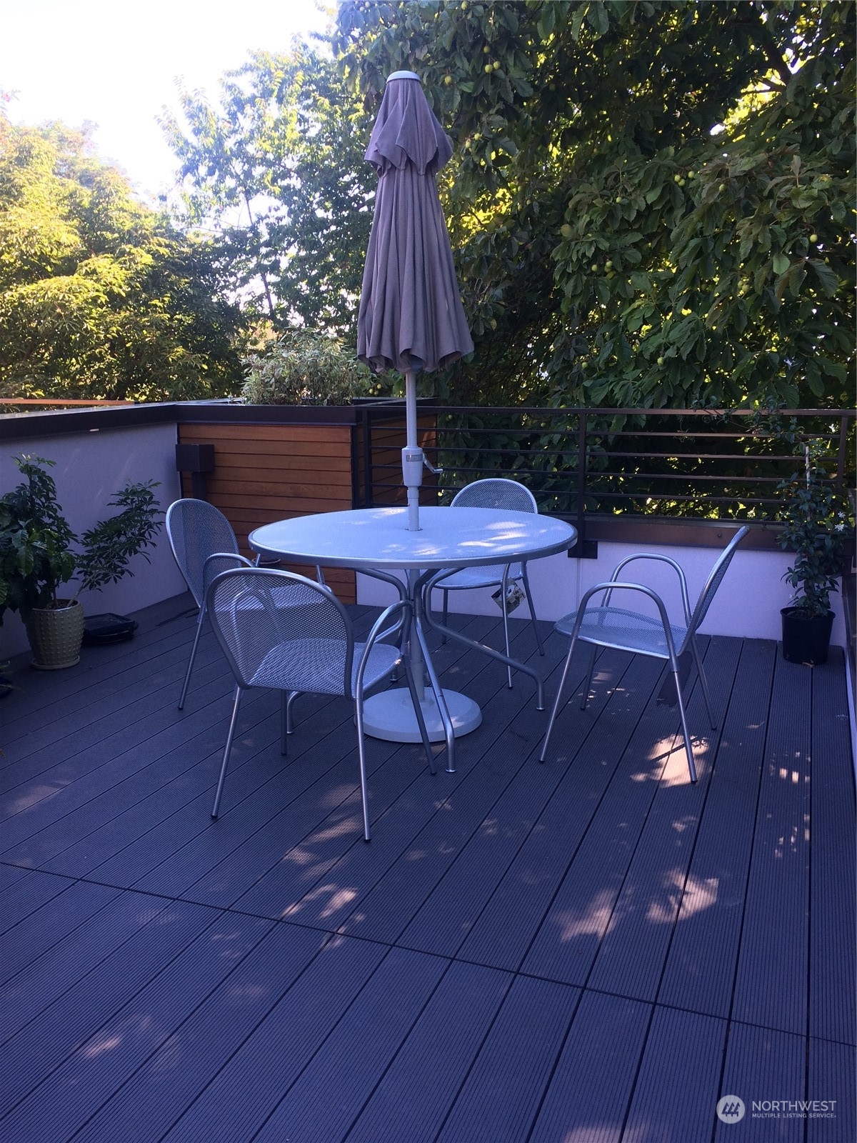 Dine al fresco on your roof-top deck oasis.