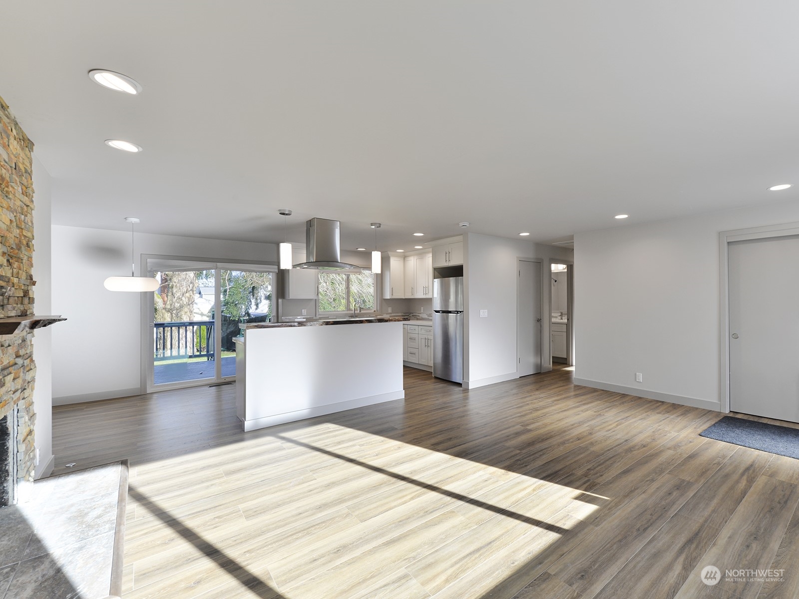 Large living room, new paint and flooring.