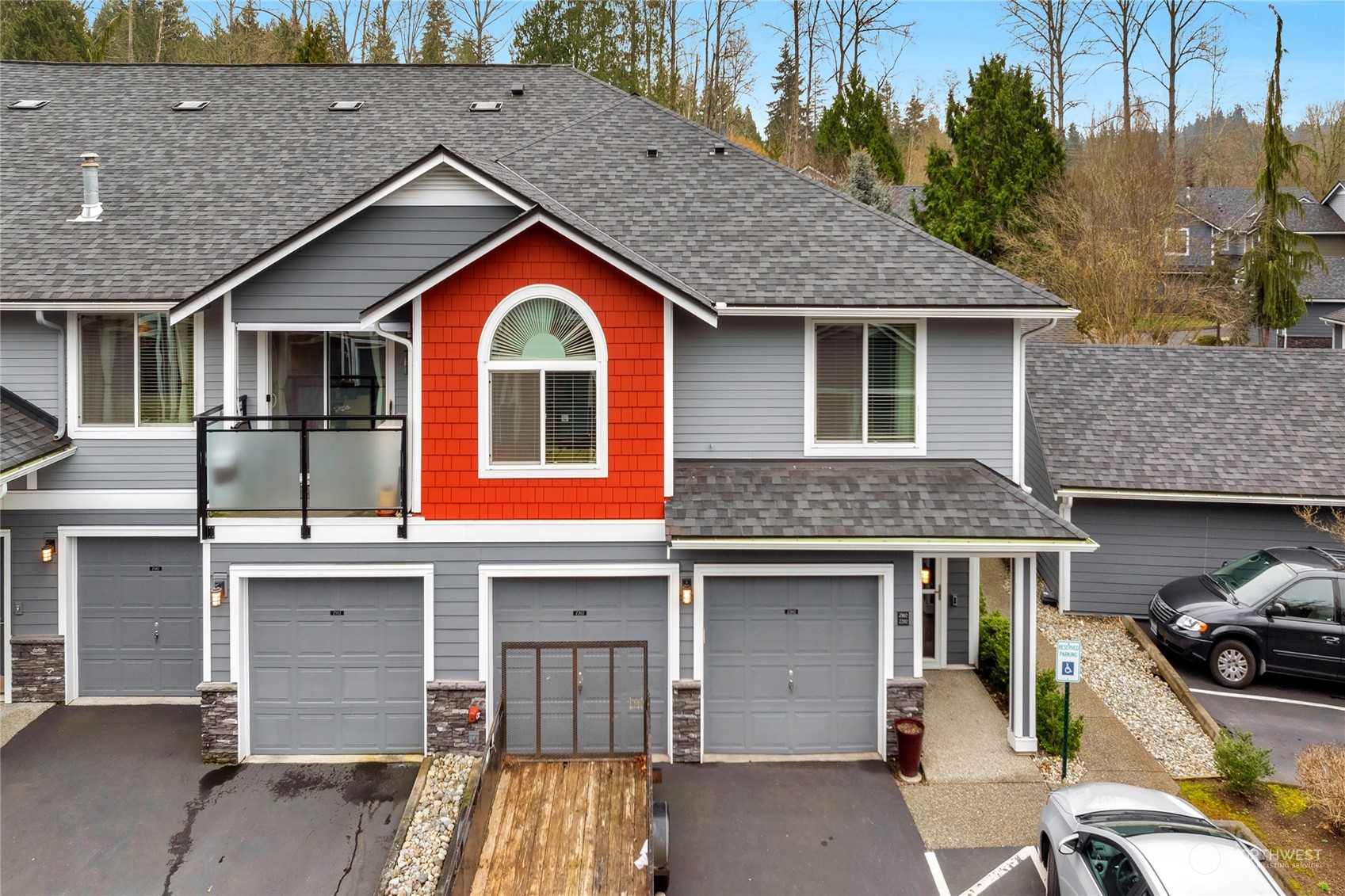 Another view. The first 2 garage doors on the left of  your entry door is the very large 2-car garage with storage cabinets and work bench.