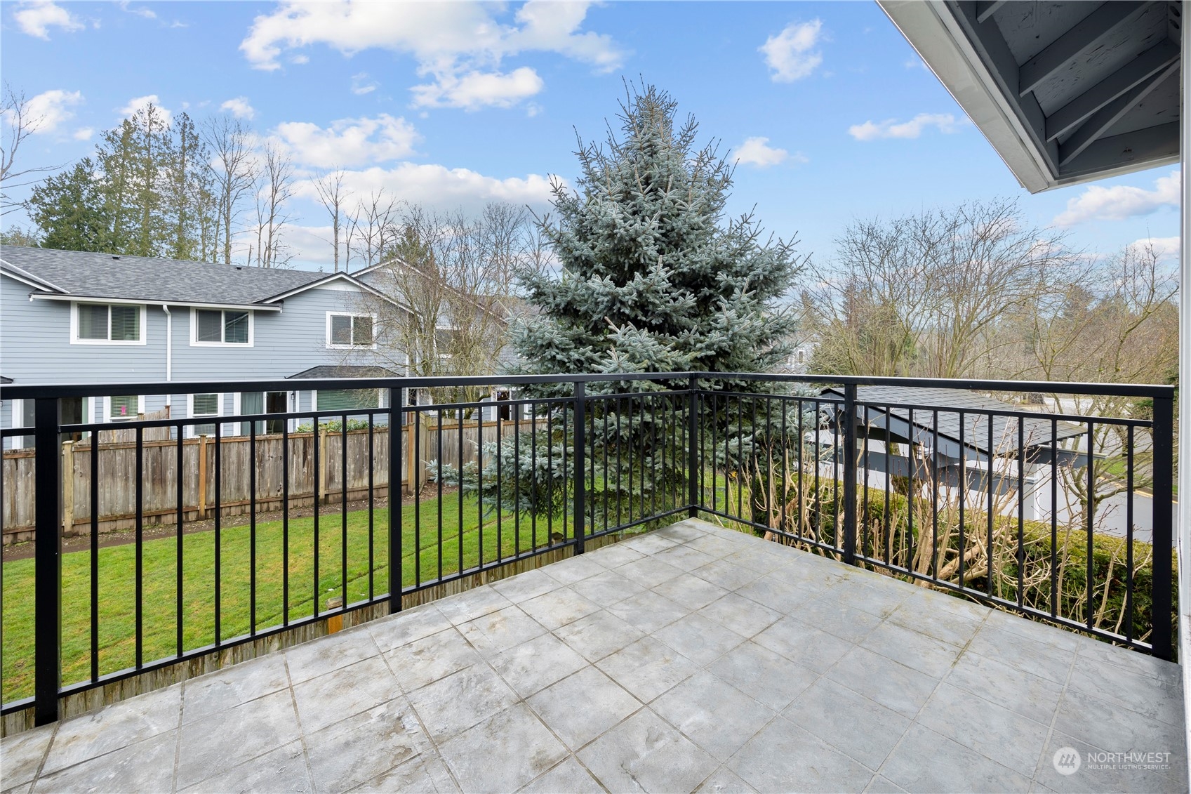 Living room has a slider door out to the back deck which looks south. A large deck of about 120 SF.