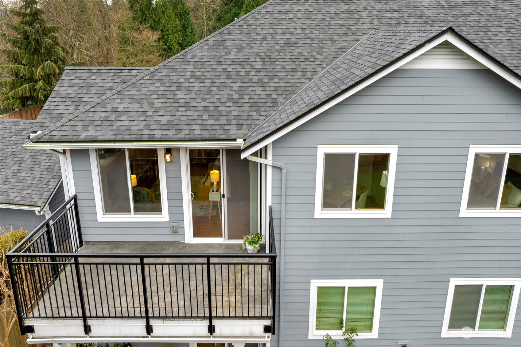 The deck looks out over a large open lawn area and gets great western and southern exposure.