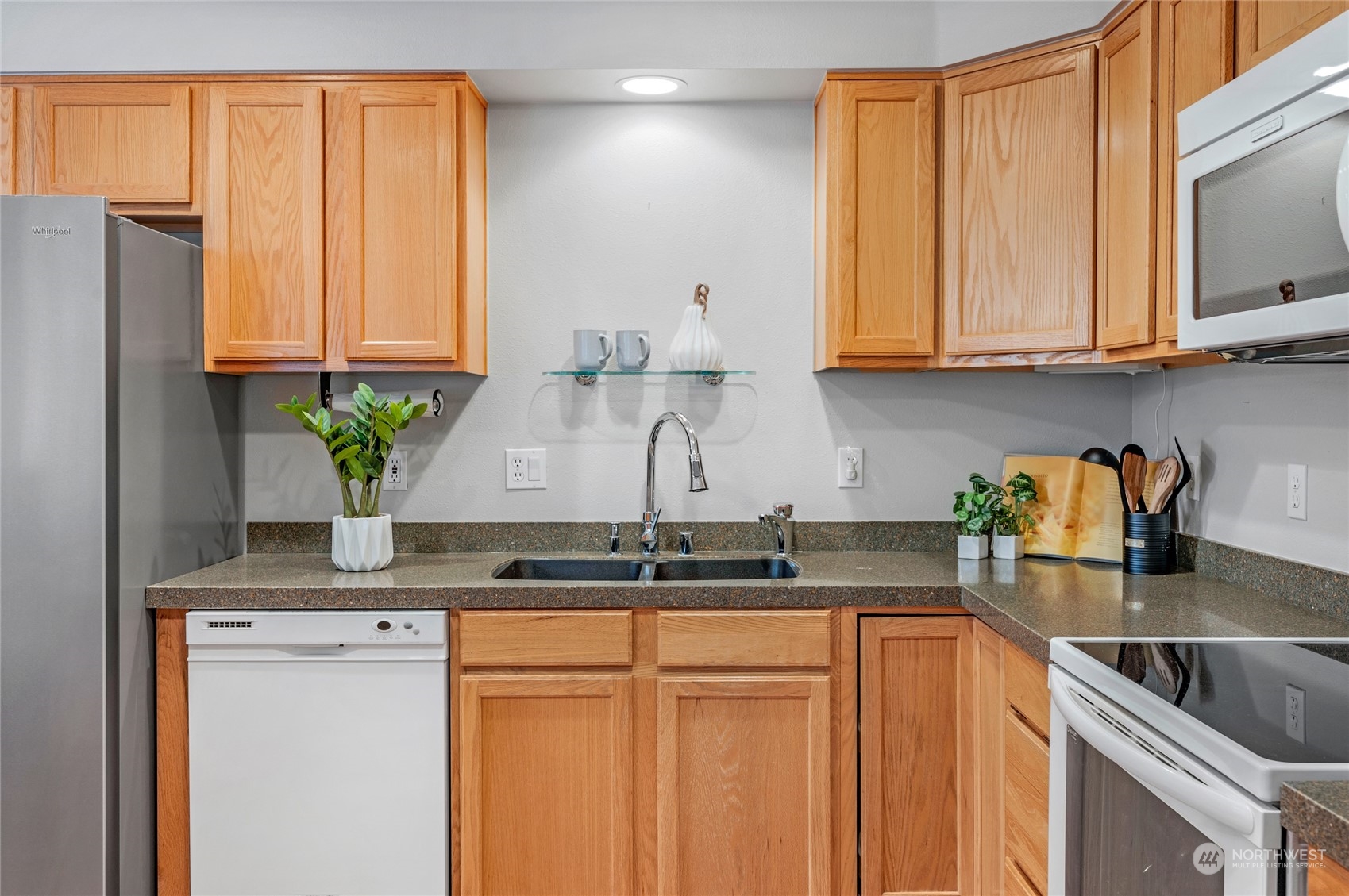 Display shelf behind the sink, Recessed Lighting in the Kitchen.