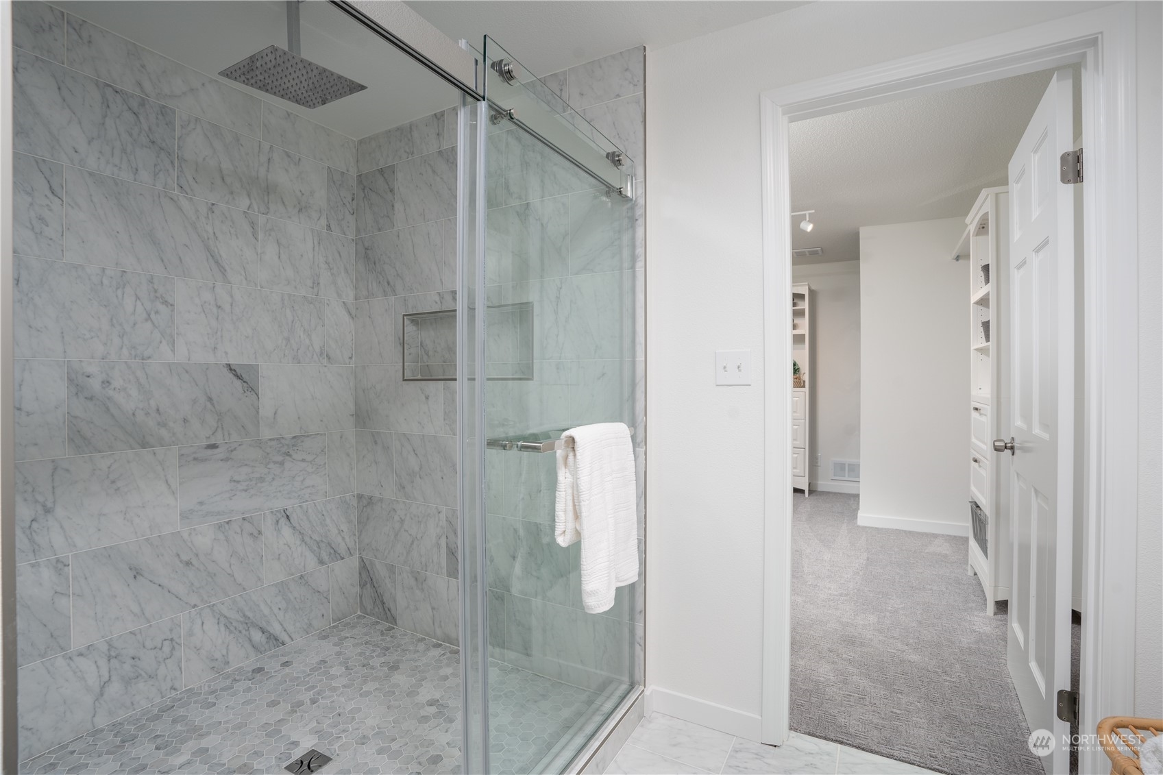 This huge shower has 6 shower heads in it