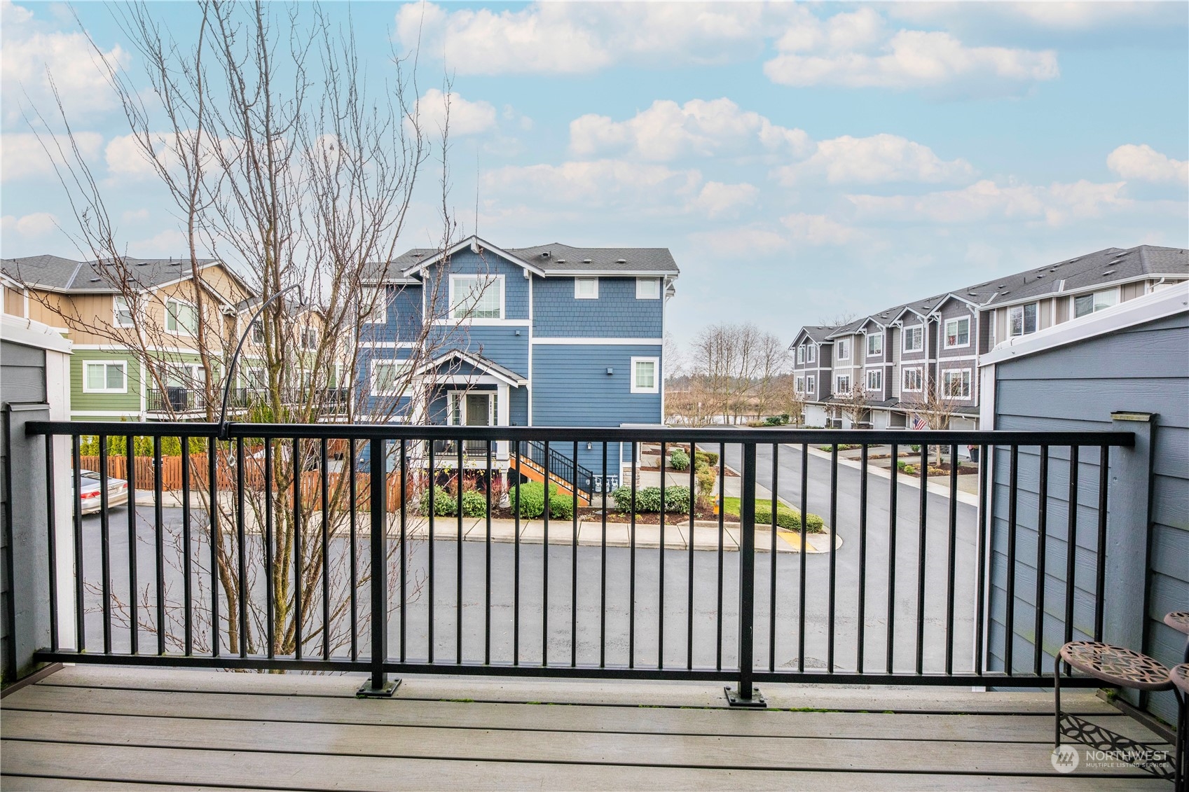 Living room and large balcony feature views of the mountains and Snohomish River - sunrise views are particularly stunning!