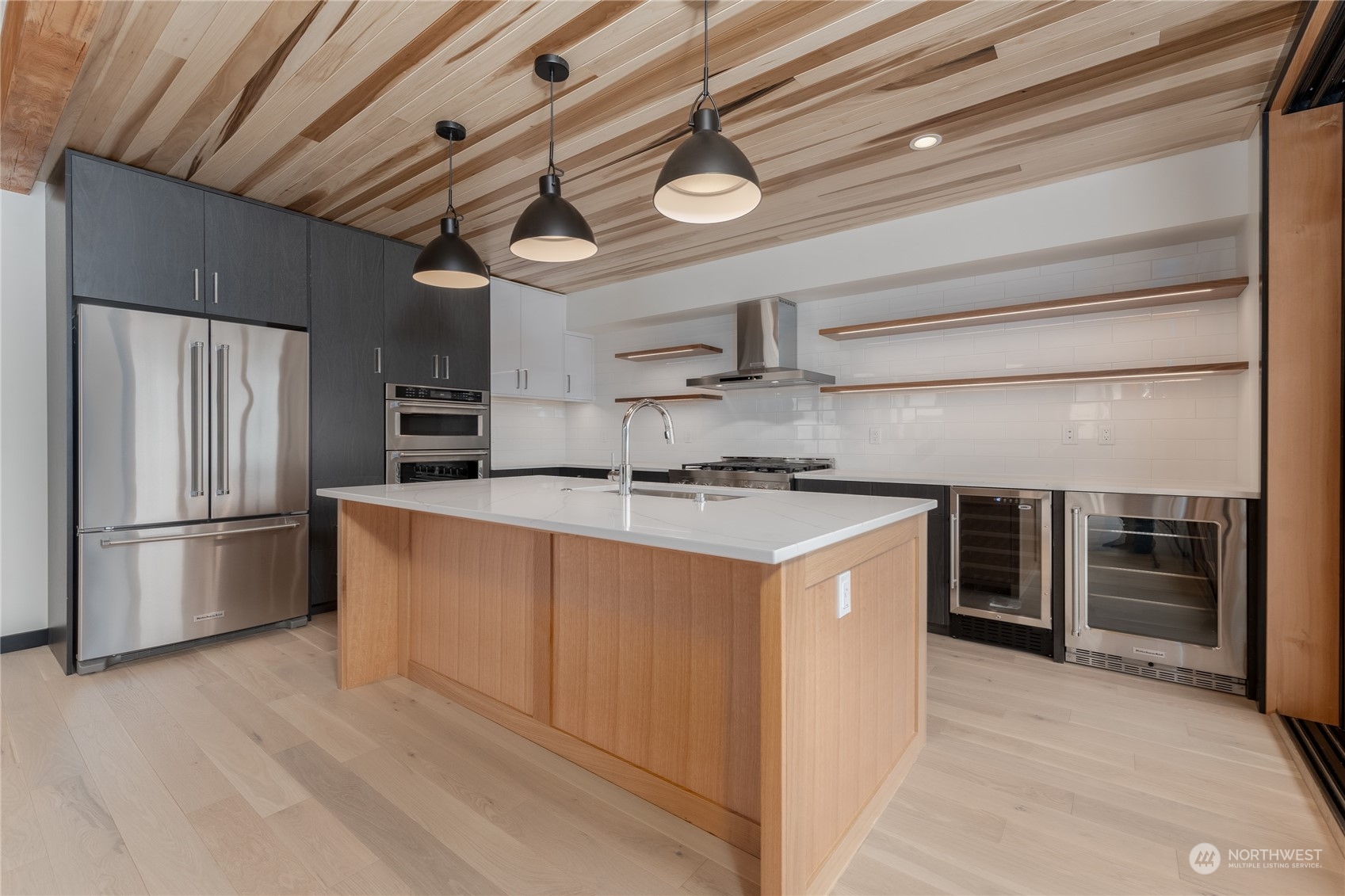 Main floor kitchen with large nesting sliding door