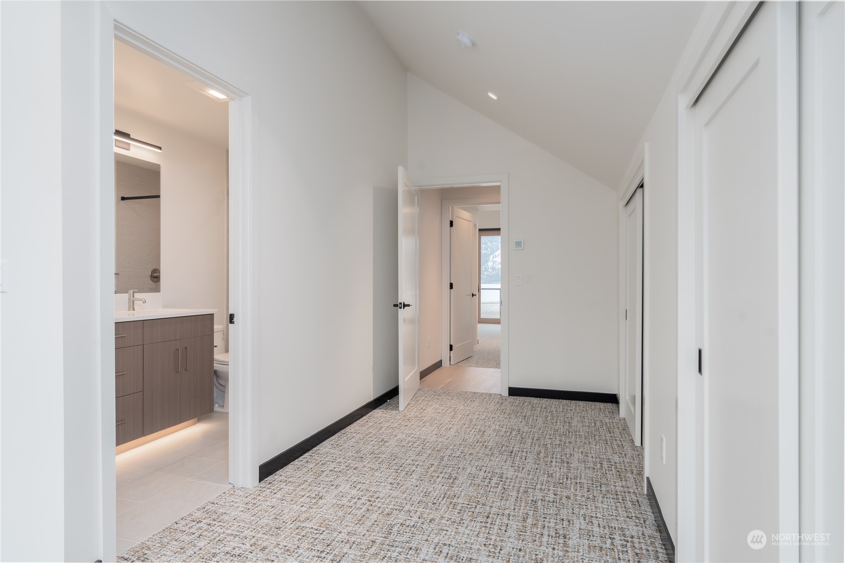 Upstairs second primary bedroom with bathroom